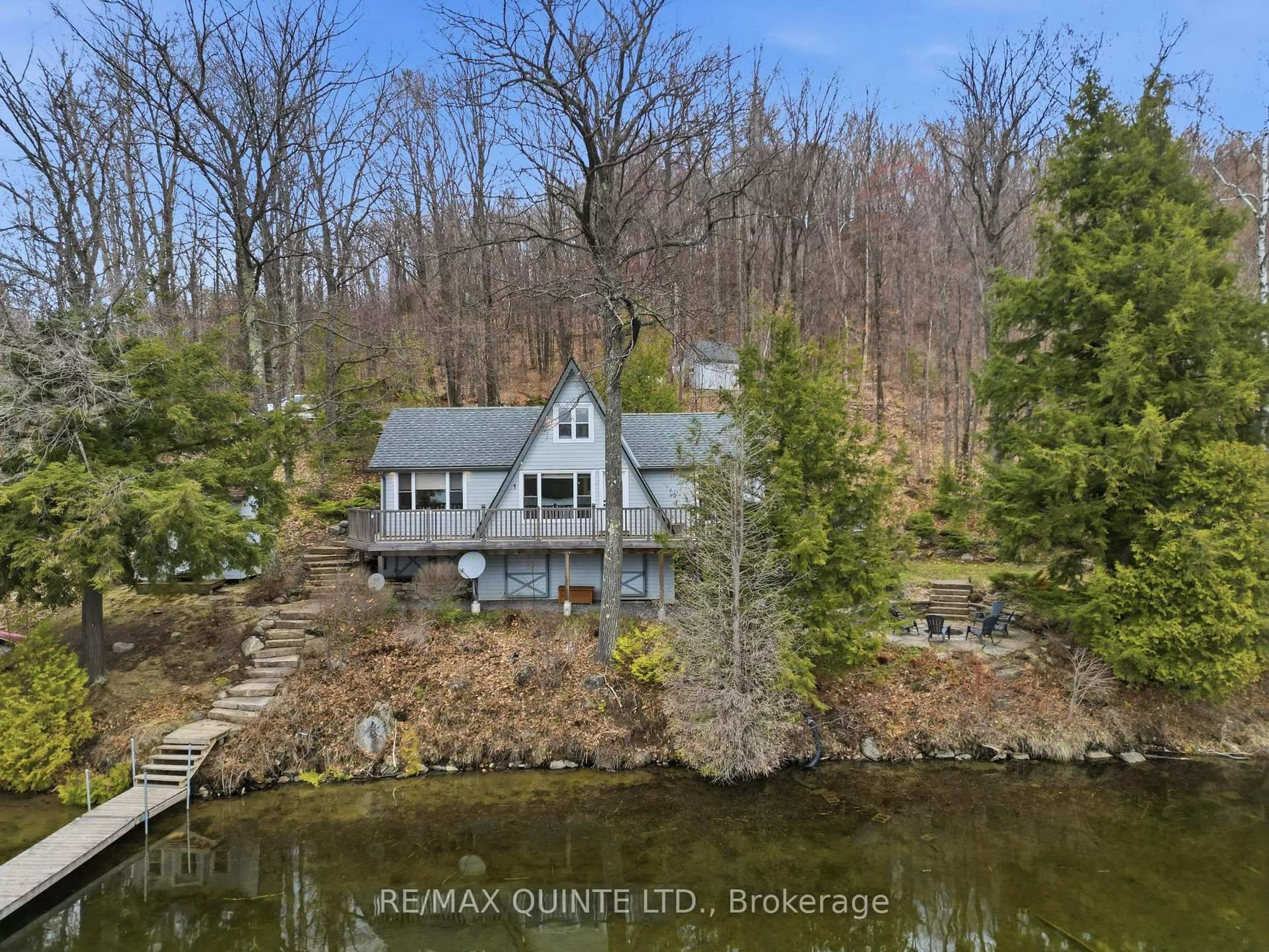 A pic from outside/outdoor area/front of a property/back of a property/a pic from drone, water/lake/river/ocean view for 203 Faradale Dr, Bancroft Ontario K0L 1C0