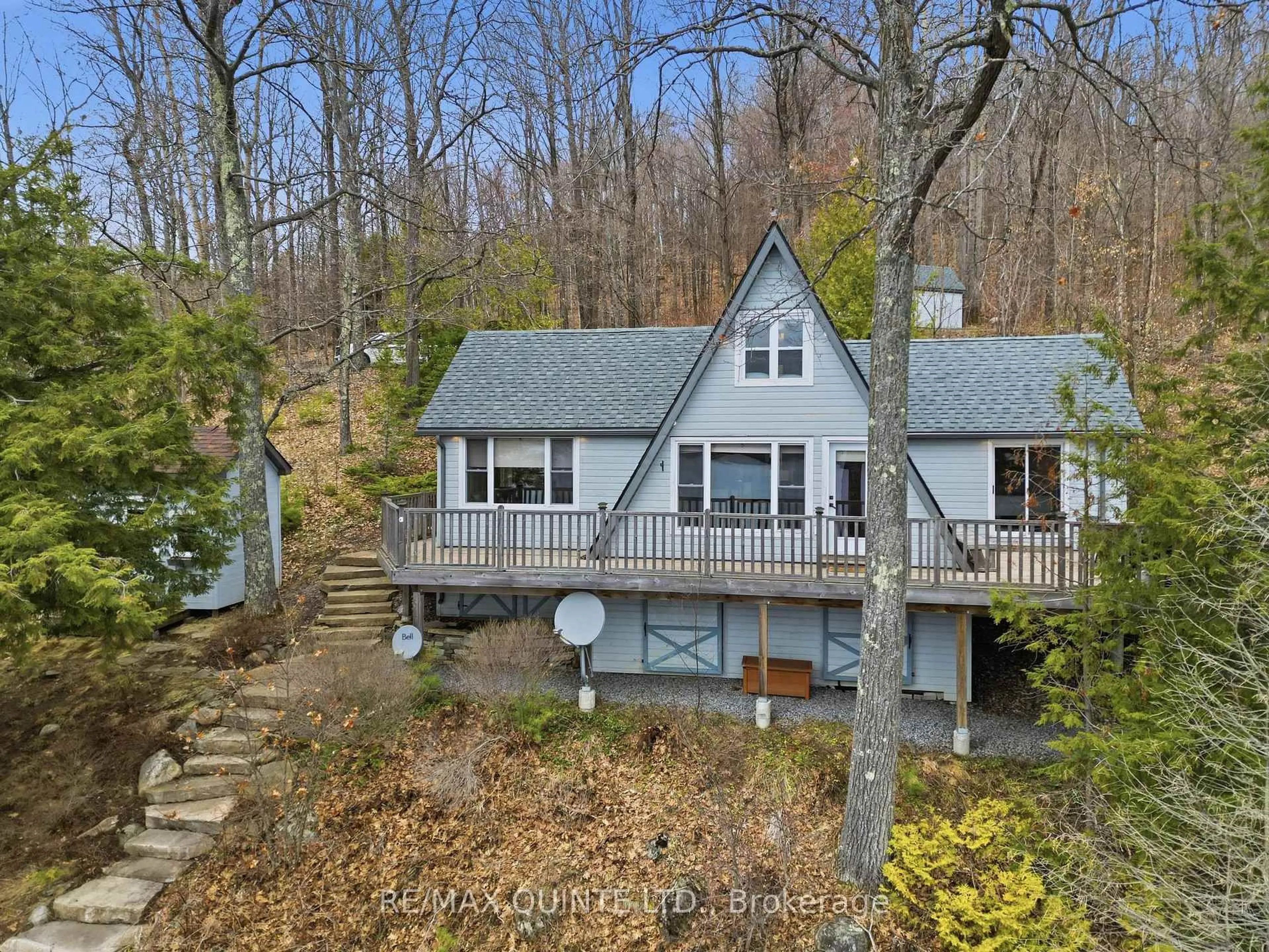 A pic from outside/outdoor area/front of a property/back of a property/a pic from drone, water/lake/river/ocean view for 203 Faradale Dr, Bancroft Ontario K0L 1C0