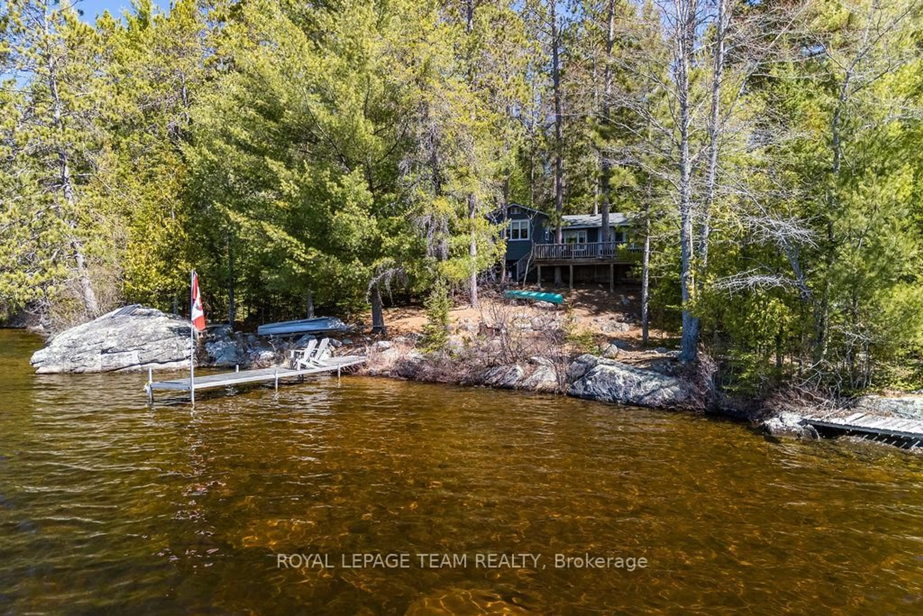 A pic from outside/outdoor area/front of a property/back of a property/a pic from drone, water/lake/river/ocean view for 218 Diamond Lake Rd, Combermere Ontario K0J 1L0