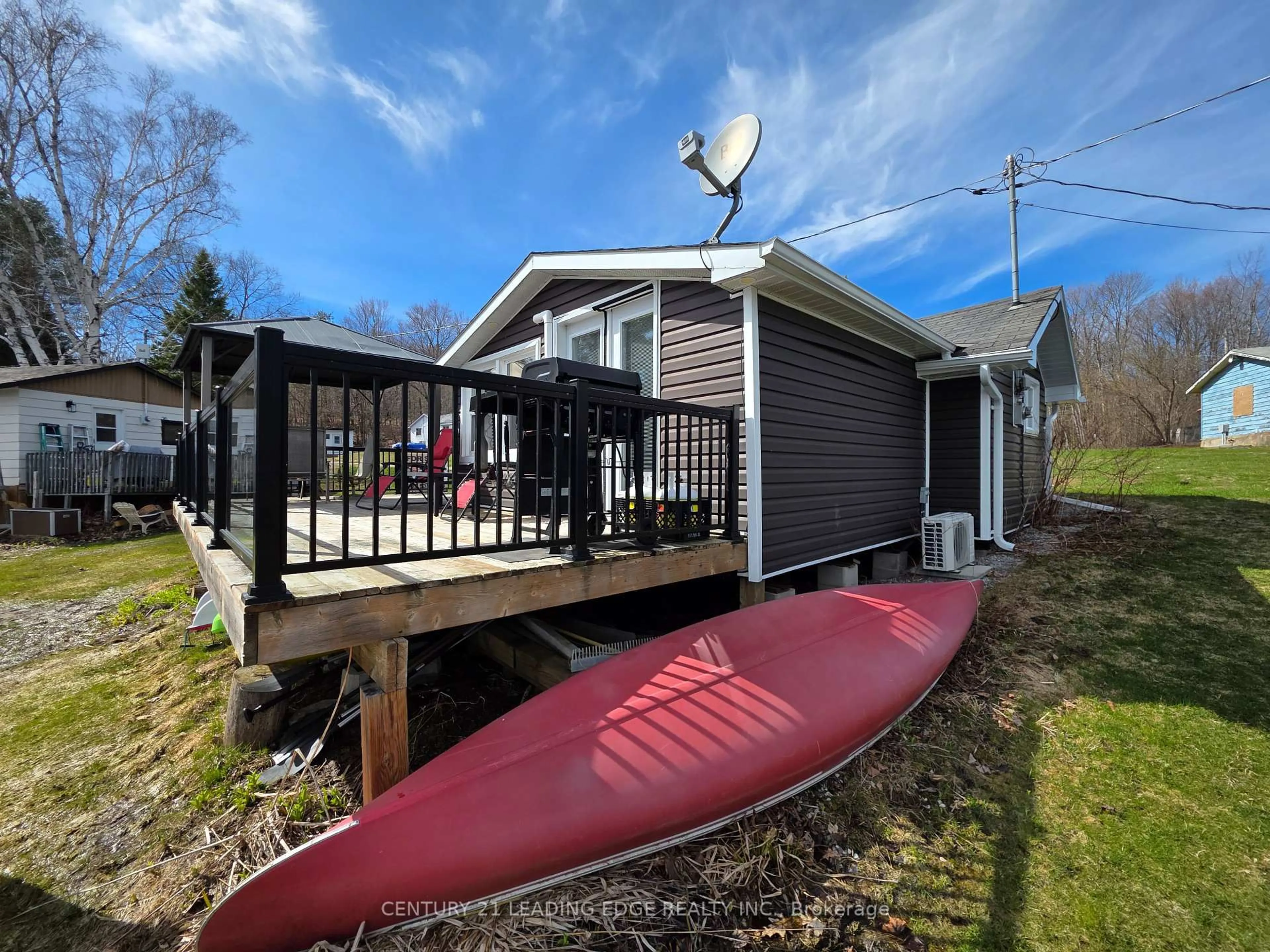 Home with vinyl exterior material, water/lake/river/ocean view for 1043 Lobo Dr #24, Minden Hills Ontario K0M 2K0