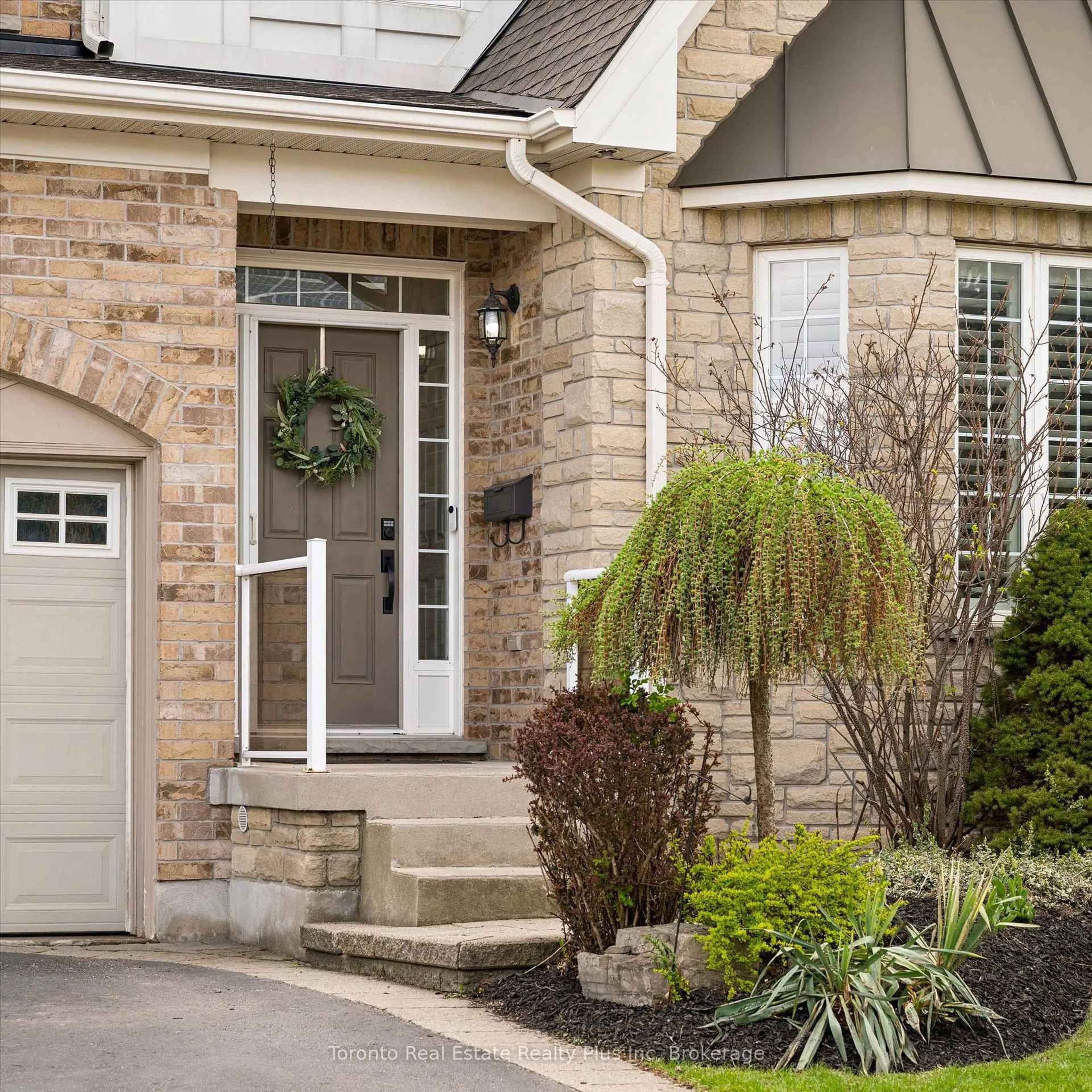 Home with brick exterior material, street for 14 Mossgrove Dr, Kitchener Ontario N2P 2Y8