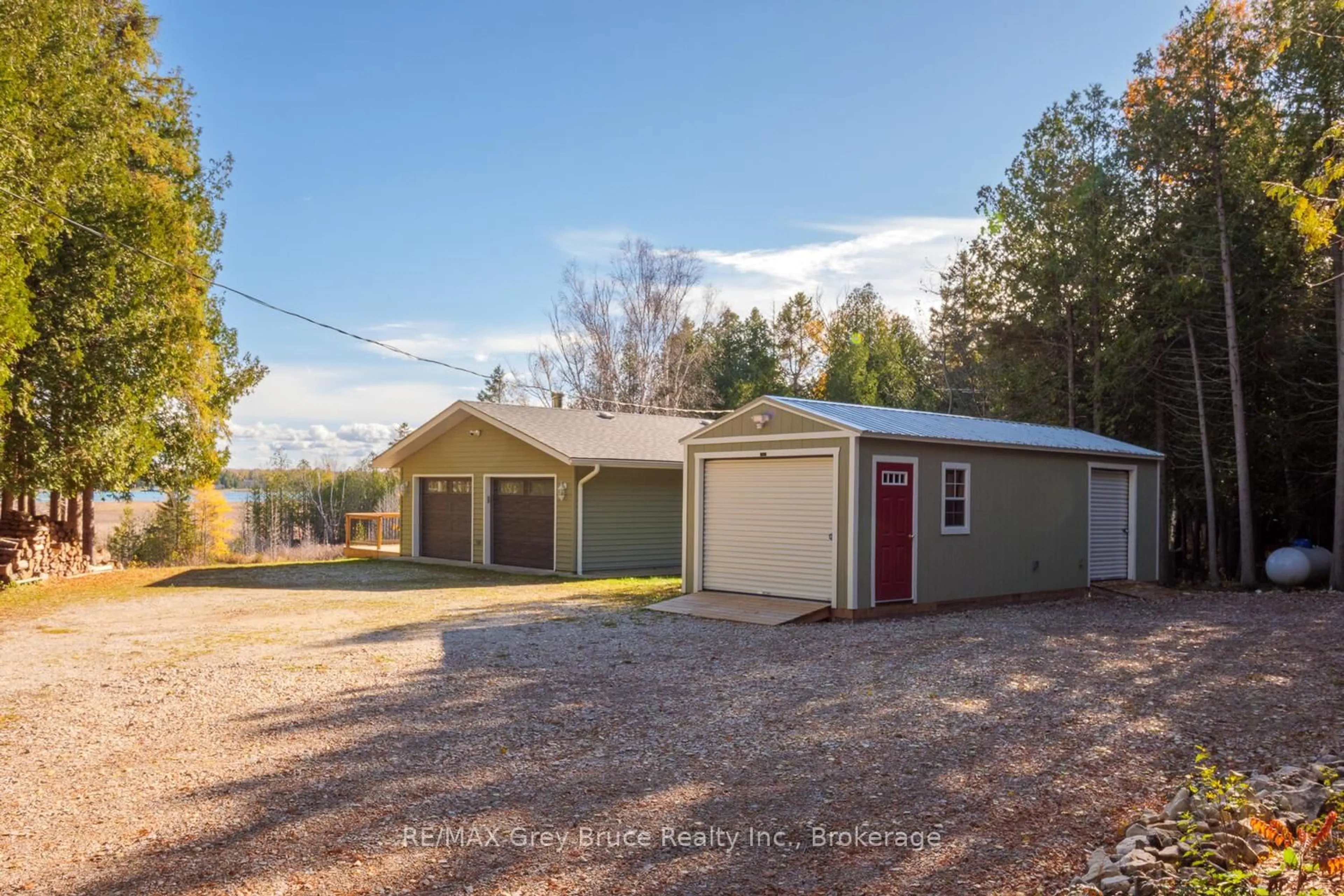 A pic from outside/outdoor area/front of a property/back of a property/a pic from drone, unknown for 109 Widgeon Cove Rd, Northern Bruce Peninsula Ontario N0H 2T0