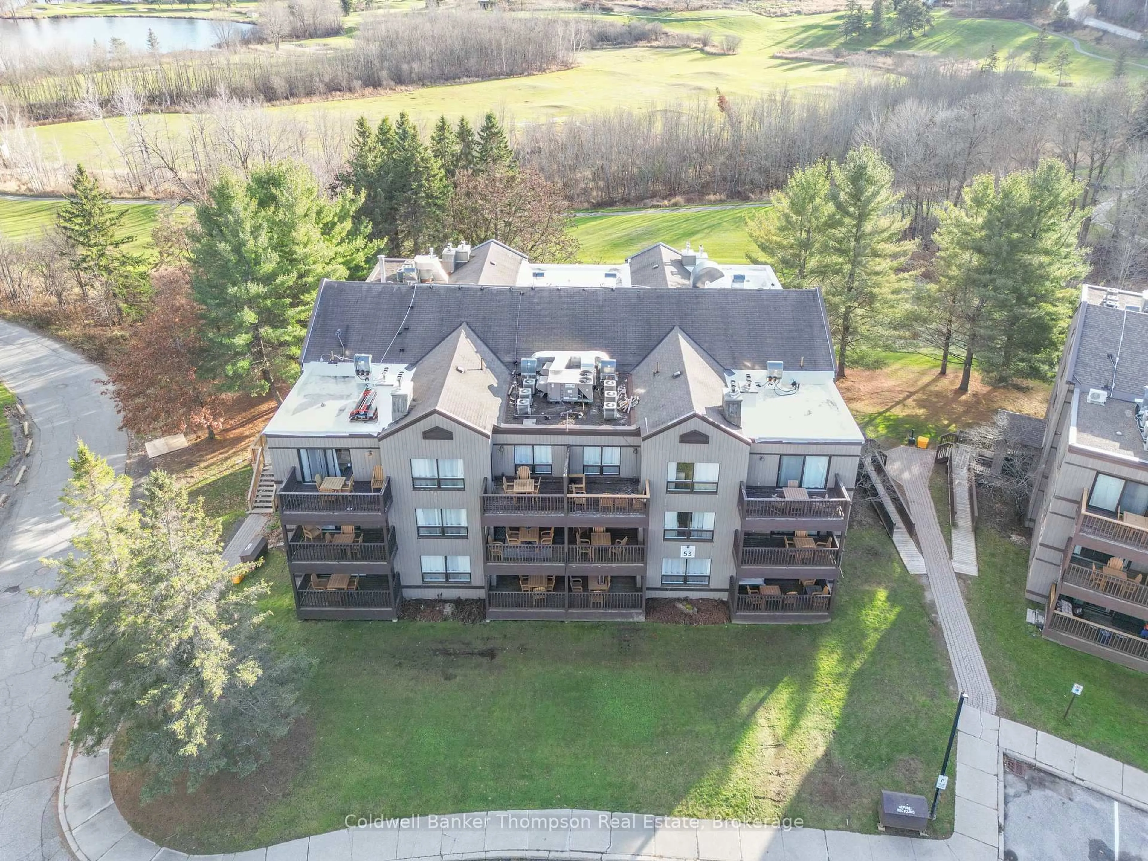 A pic from outside/outdoor area/front of a property/back of a property/a pic from drone, unknown for 1235 DEERHURST Dr #53-201, Huntsville Ontario P1H 2E8