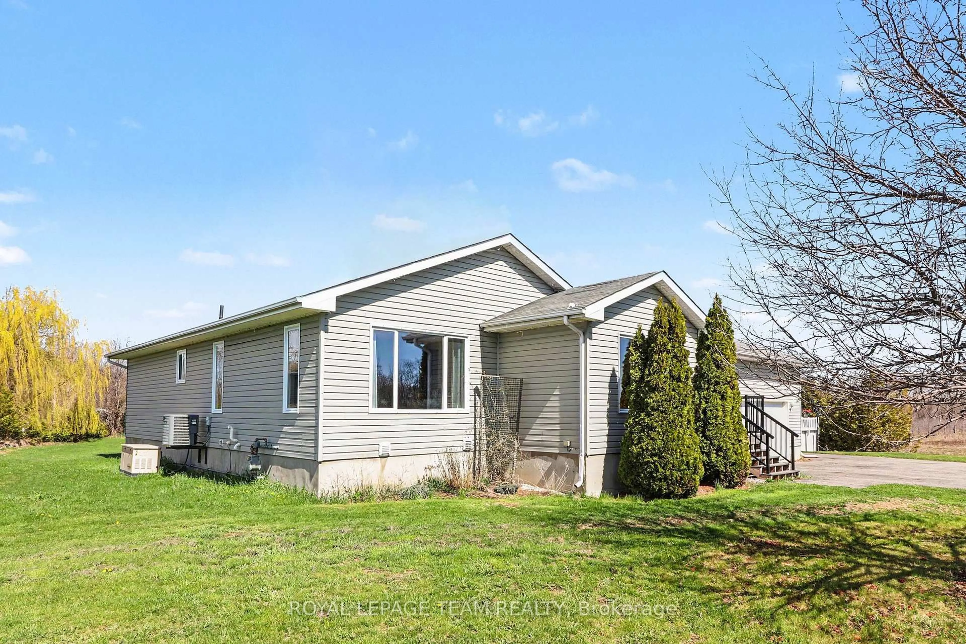 Home with vinyl exterior material, street for 4038 Calbrent Way, Osgoode Ontario K0A 2W0