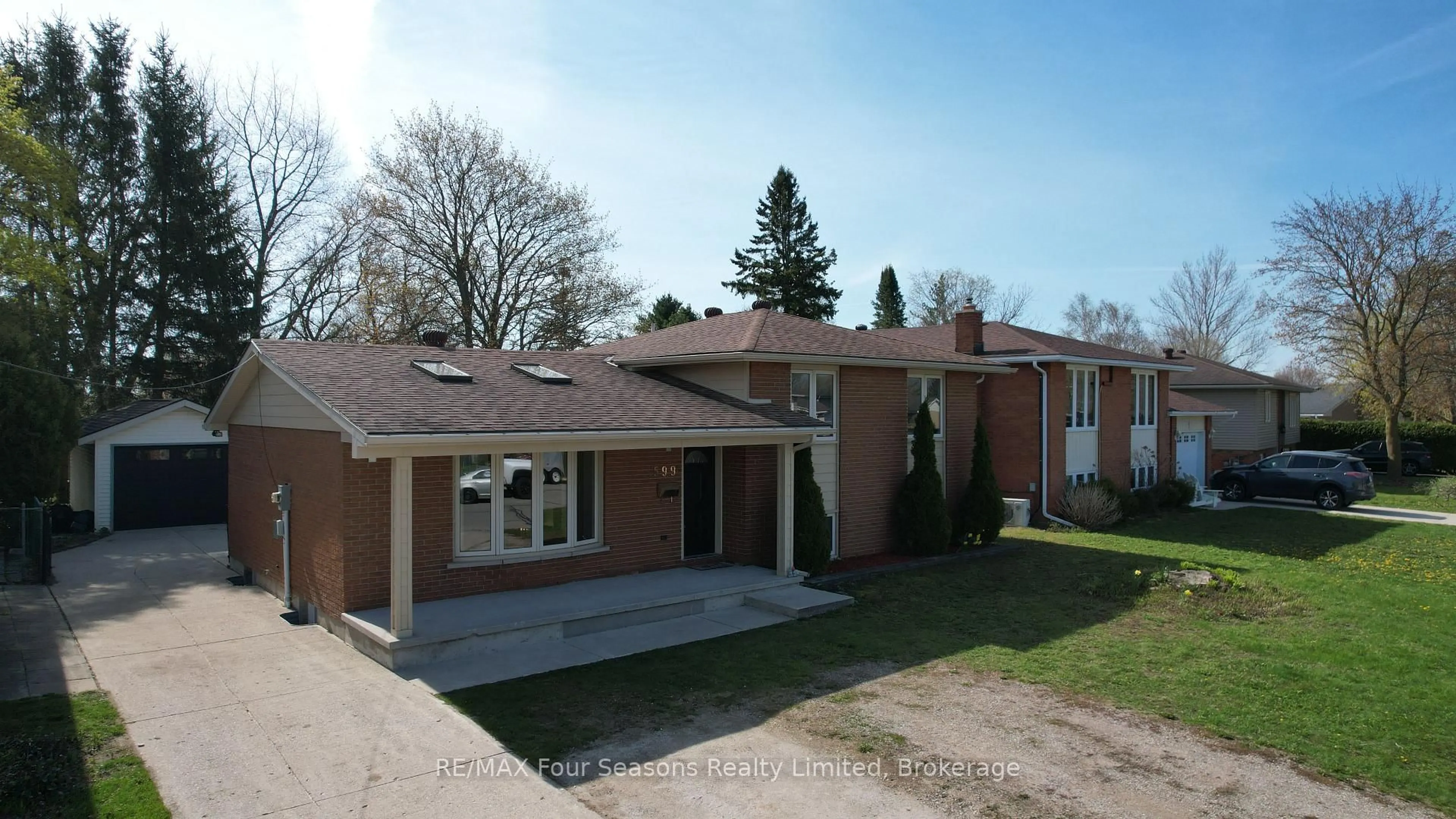 Home with brick exterior material, street for 599 Thede Dr, Saugeen Shores Ontario N0H 2C4