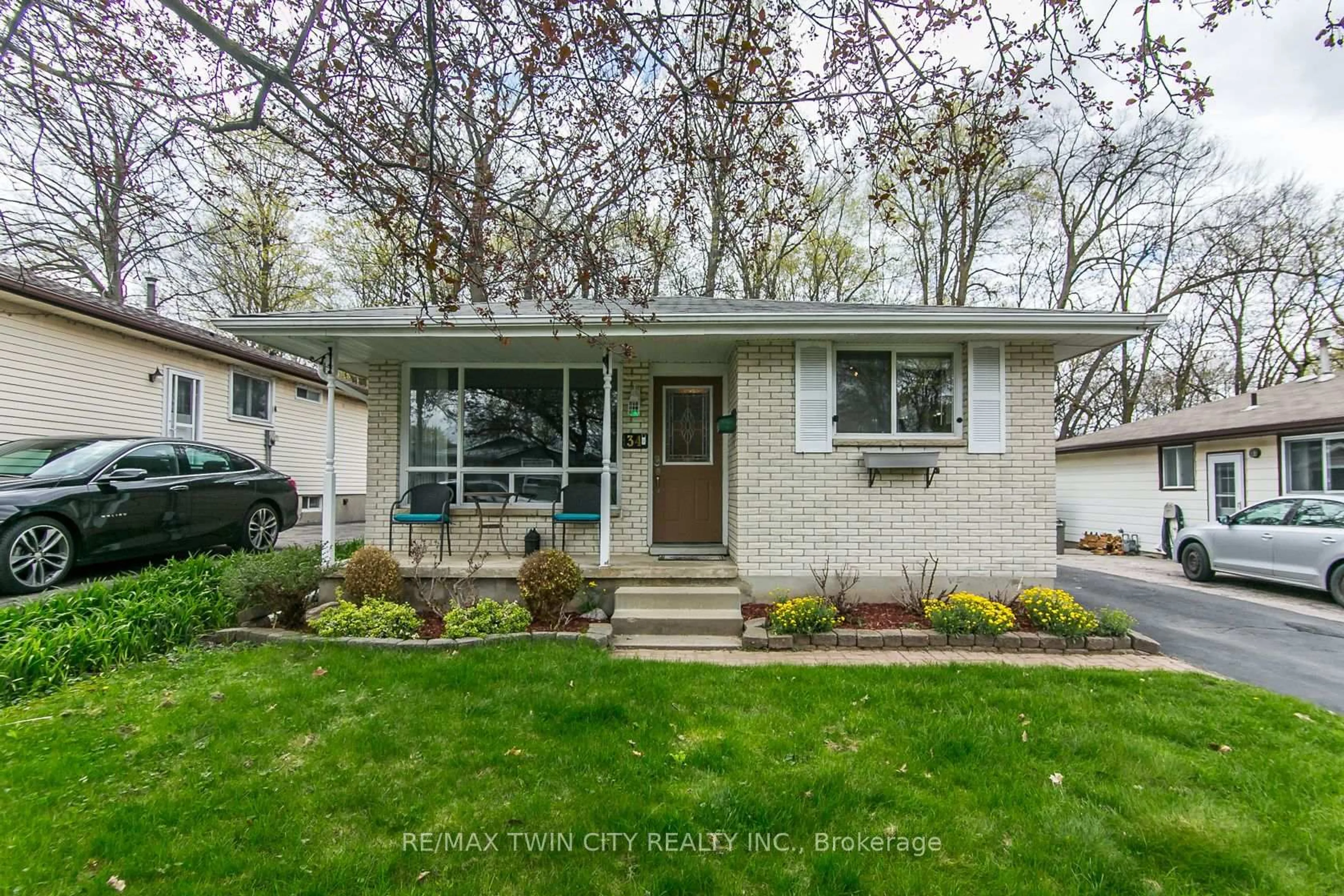 Home with vinyl exterior material, street for 34 Blackhorne Cres, Kitchener Ontario N2E 1T1