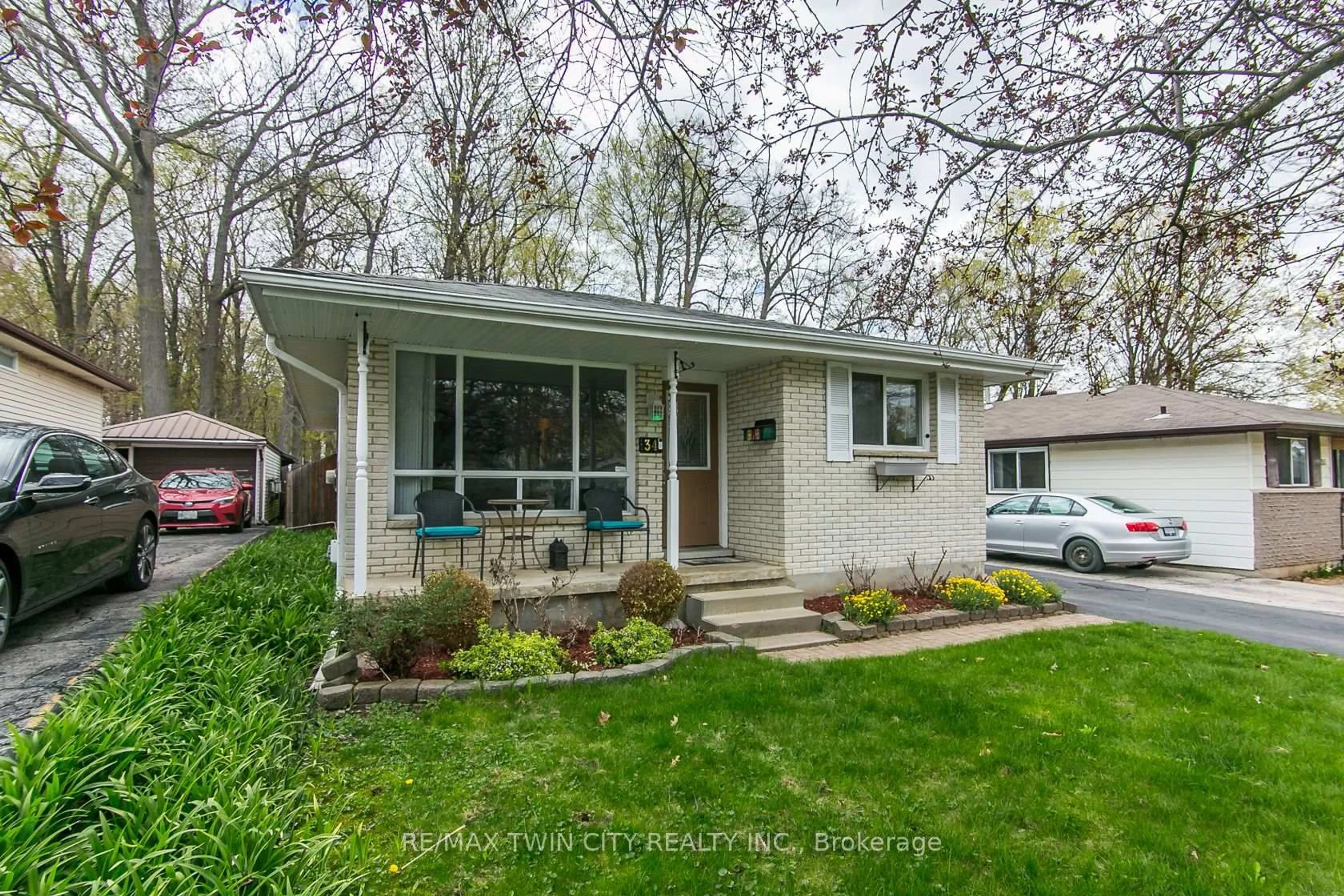 Home with vinyl exterior material, street for 34 Blackhorne Cres, Kitchener Ontario N2E 1T1