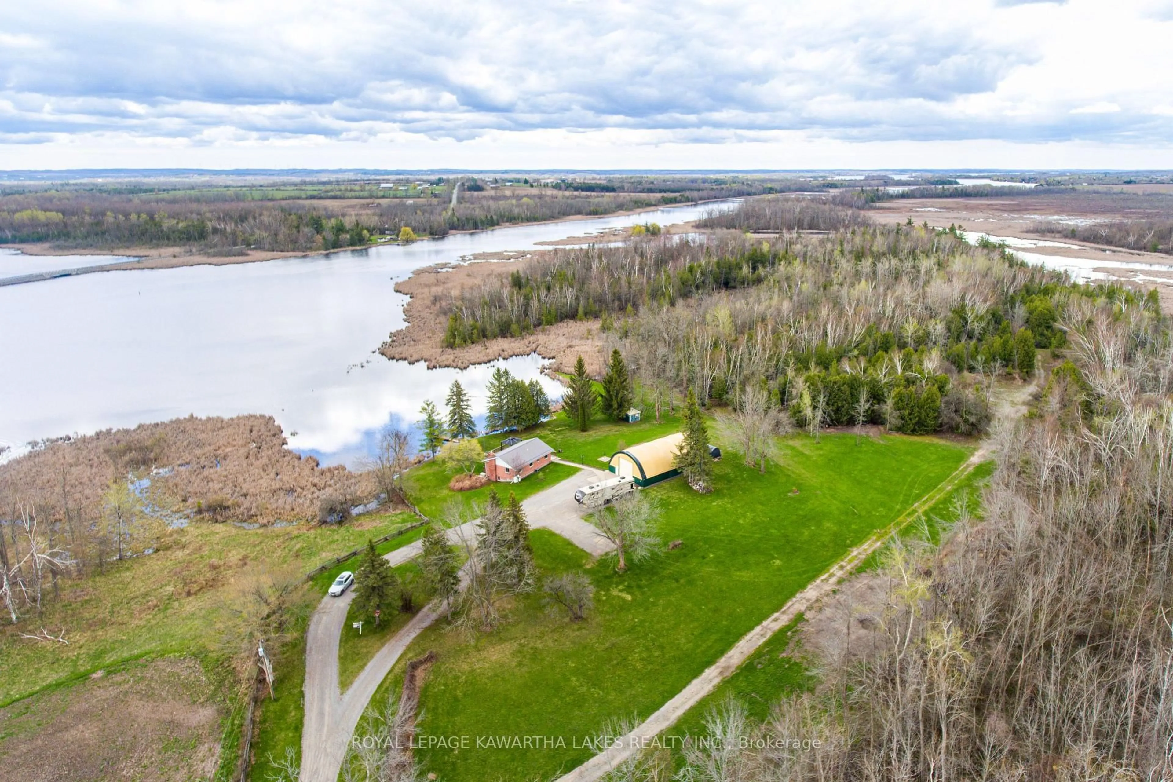 A pic from outside/outdoor area/front of a property/back of a property/a pic from drone, water/lake/river/ocean view for 1 Bridle Rd, Kawartha Lakes Ontario K9V 4R2