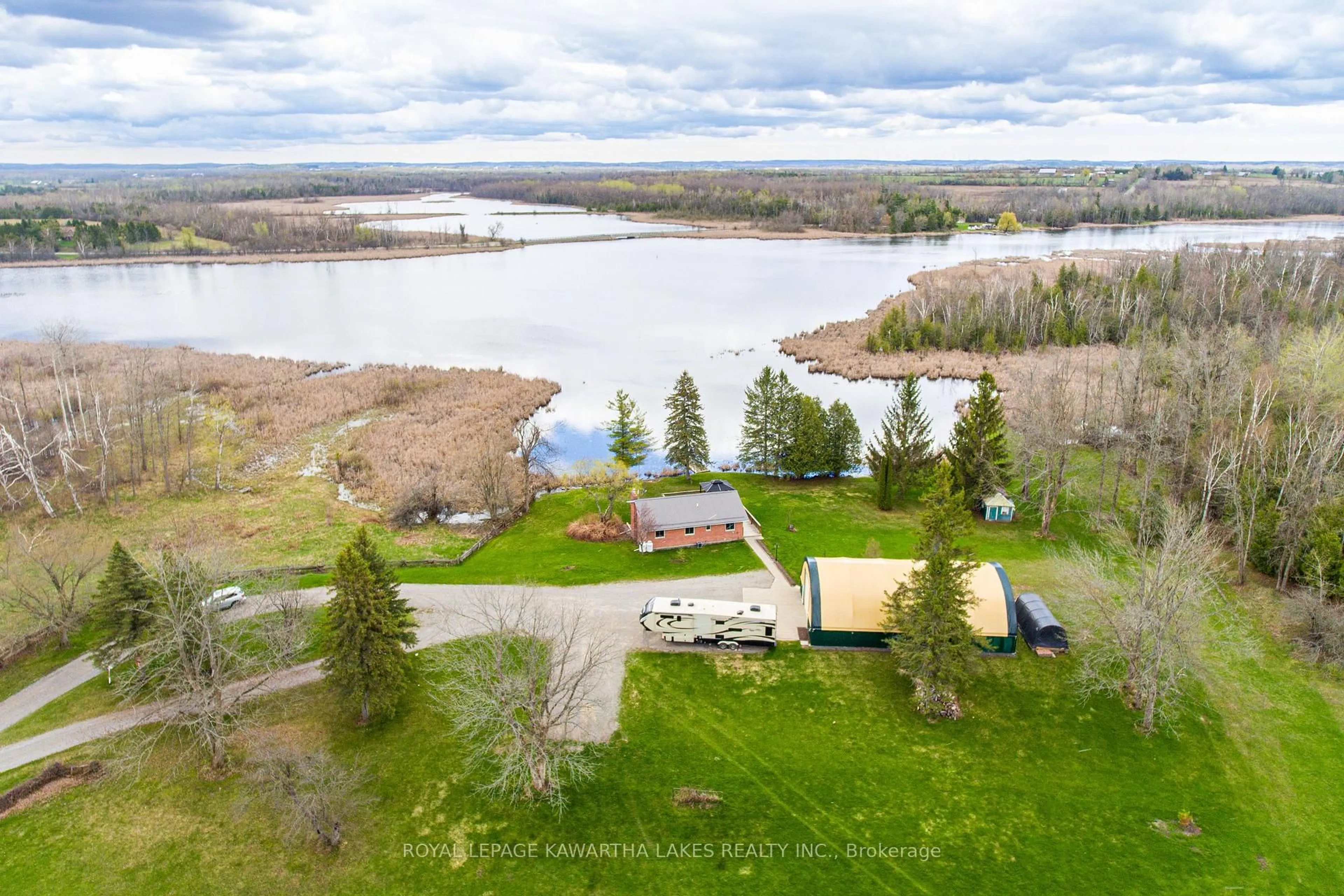 A pic from outside/outdoor area/front of a property/back of a property/a pic from drone, water/lake/river/ocean view for 1 Bridle Rd, Kawartha Lakes Ontario K9V 4R2