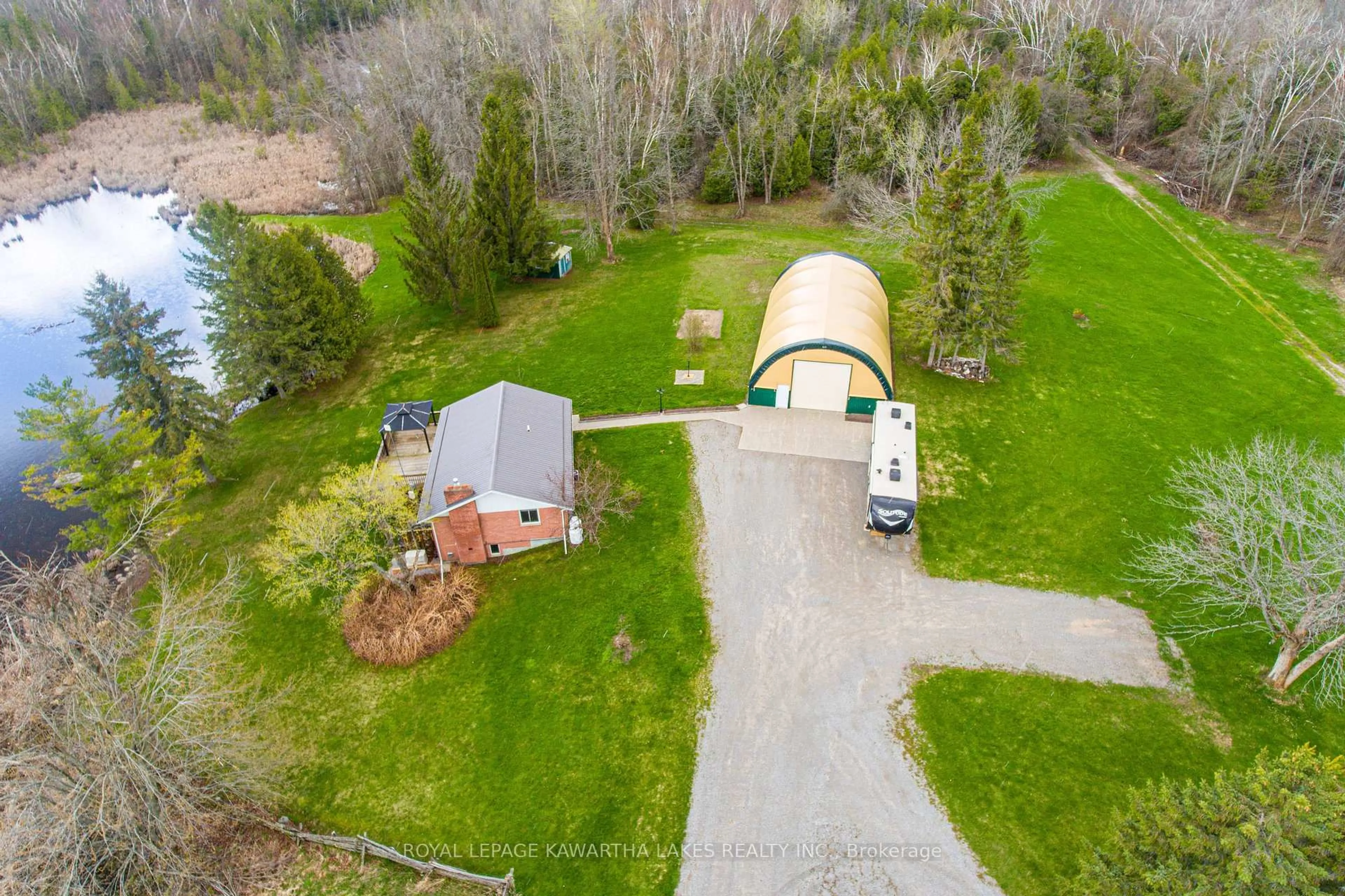 A pic from outside/outdoor area/front of a property/back of a property/a pic from drone, unknown for 1 Bridle Rd, Kawartha Lakes Ontario K9V 4R2