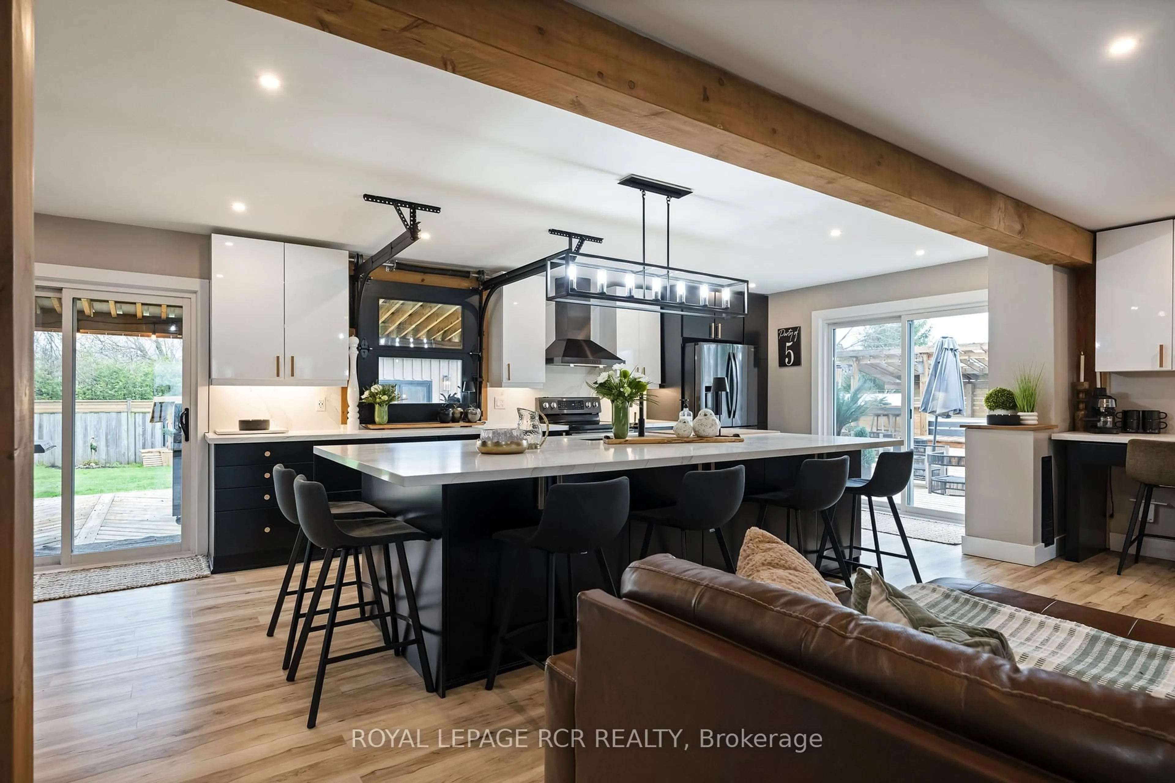 Open concept kitchen, wood/laminate floor for 2 Grand Cres, East Garafraxa Ontario L9W 7L6
