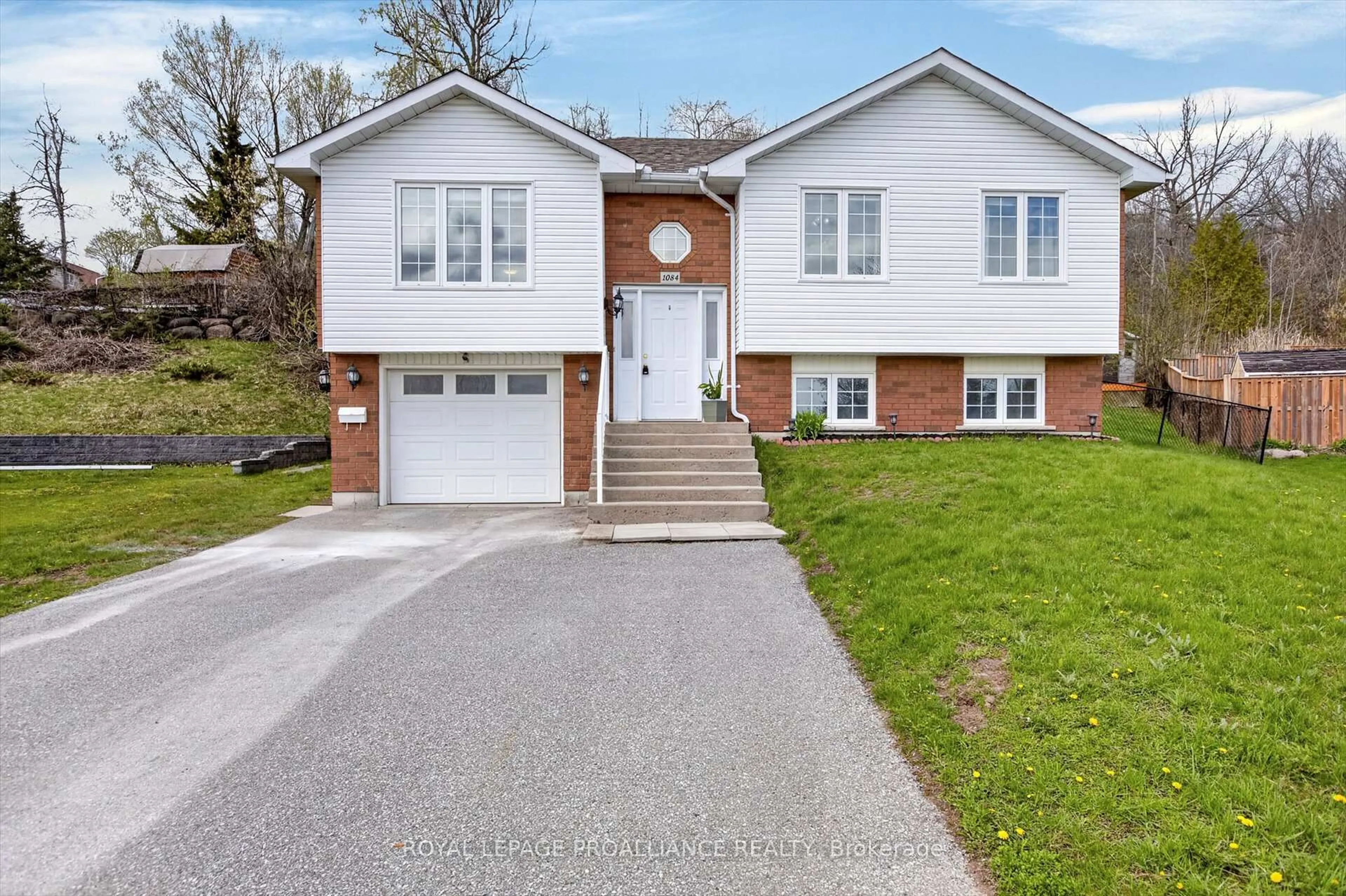 Home with brick exterior material, street for 1084 Afton Rd, Peterborough Ontario K9J 8L2