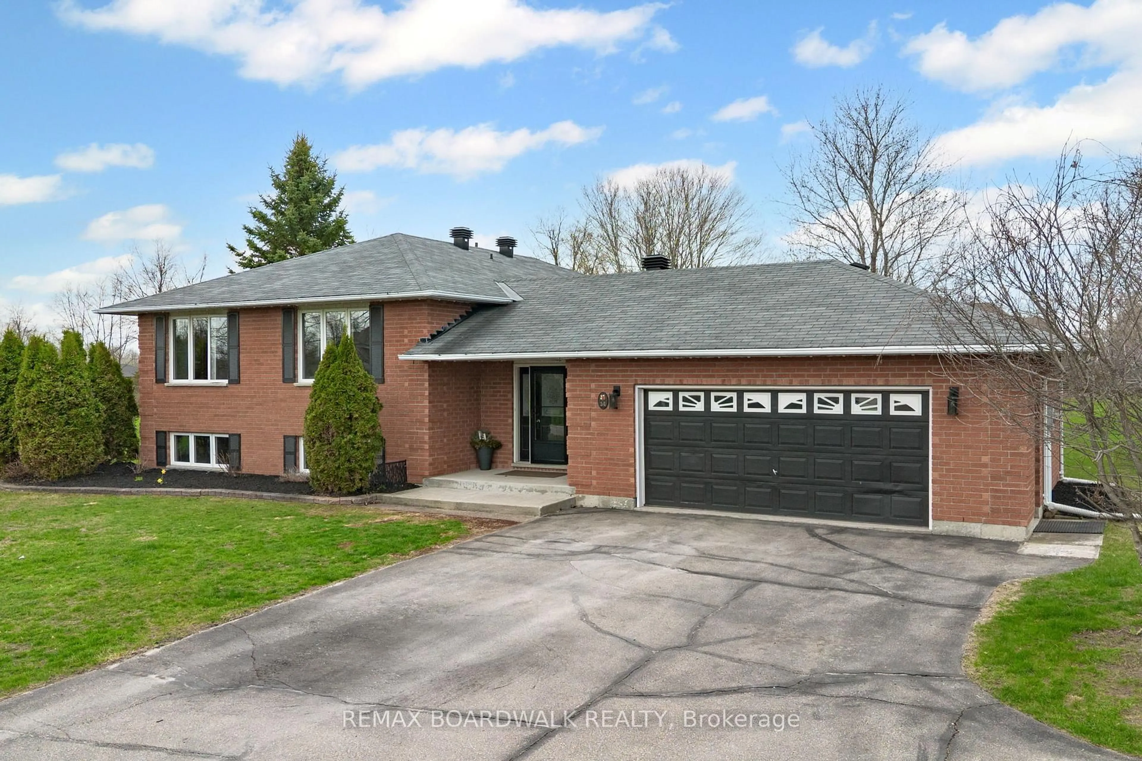 Home with brick exterior material, street for 14 Davis Lane, Rideau Lakes Ontario K7A 4S5
