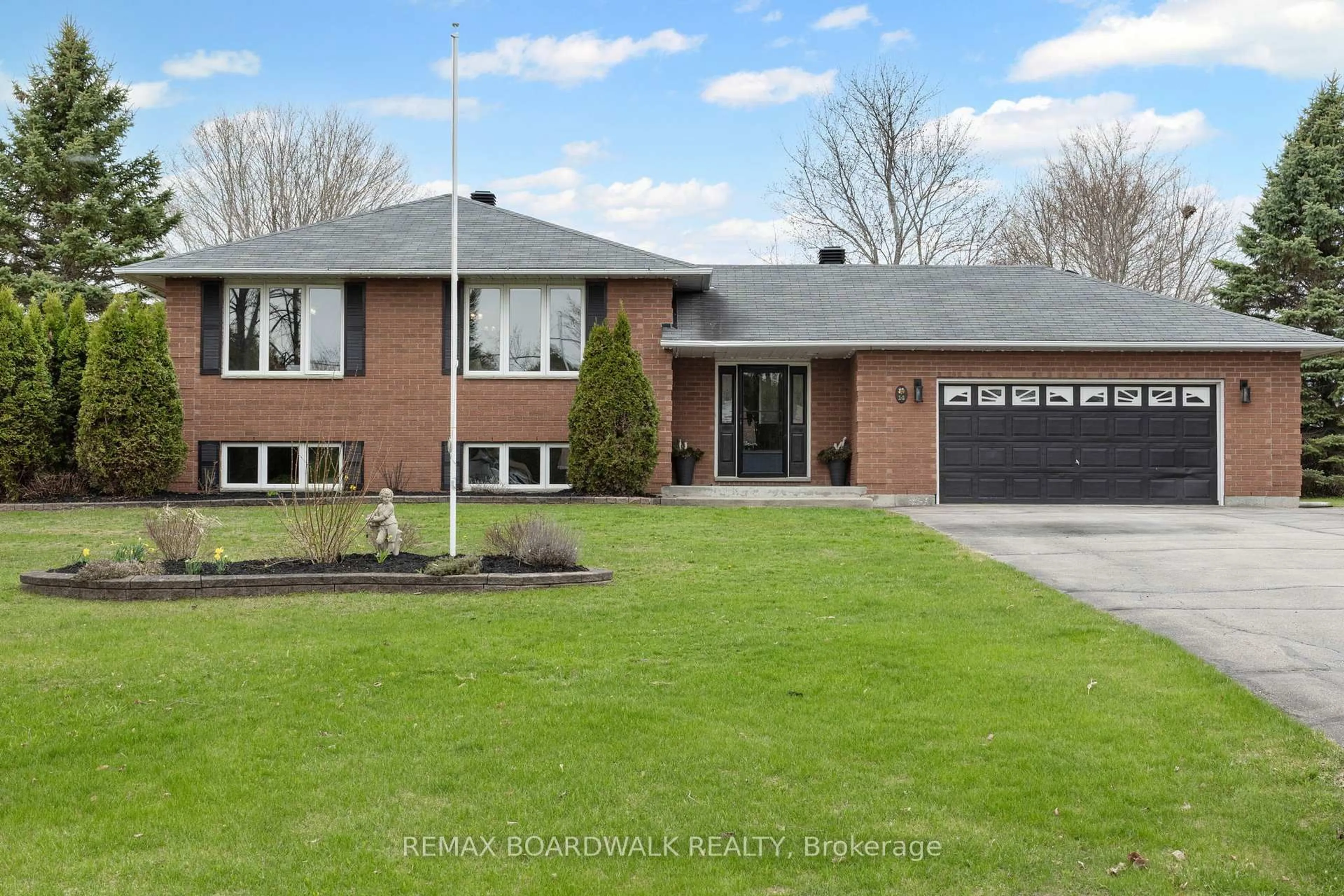 Home with brick exterior material, street for 14 Davis Lane, Rideau Lakes Ontario K7A 4S5