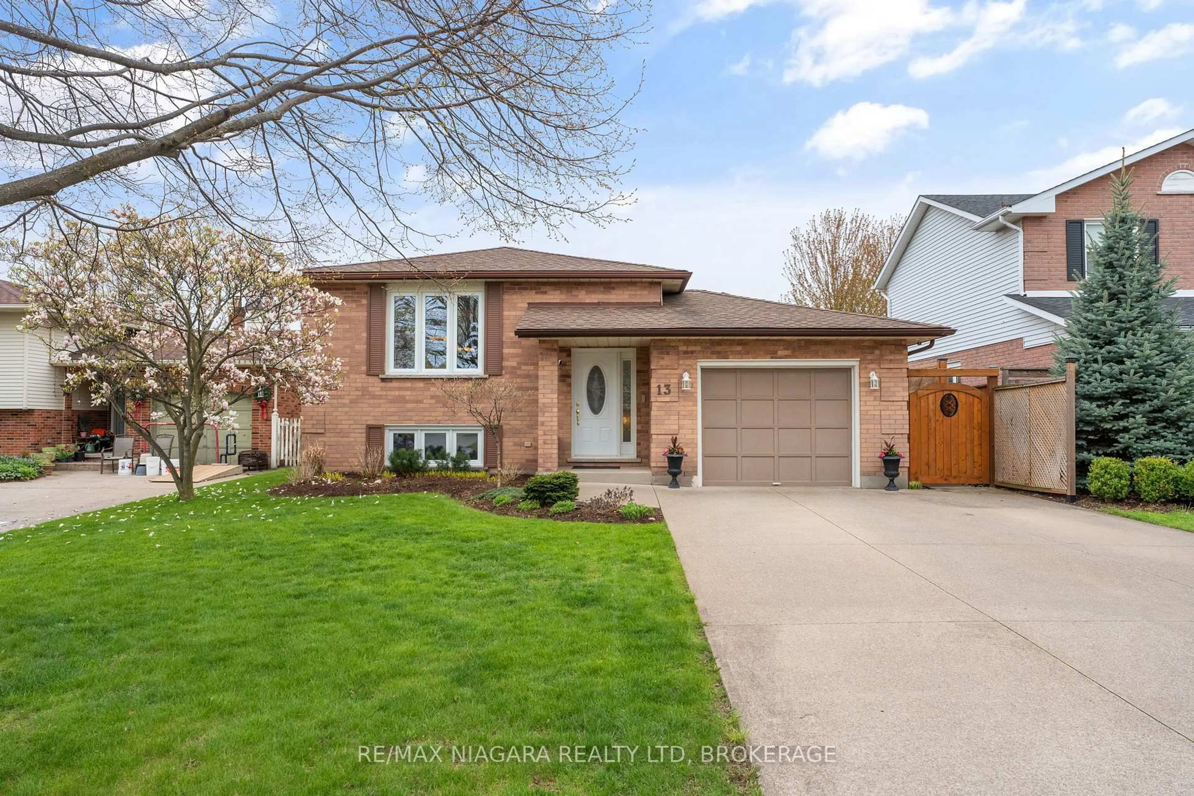 Home with brick exterior material, street for 13 Cornwell Circ, St. Catharines Ontario L2S 3C4