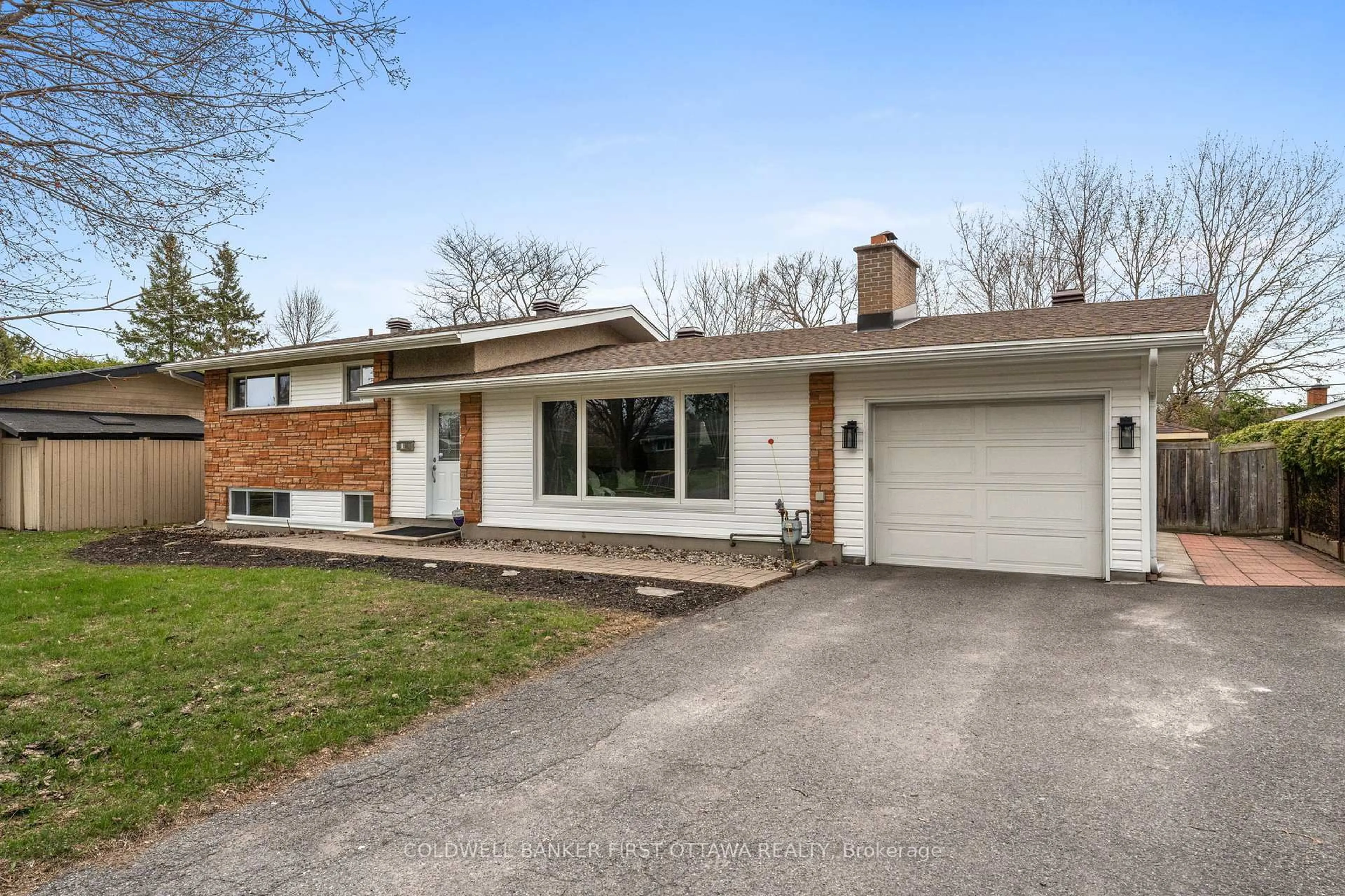 Home with brick exterior material, street for 18 Tiverton Dr, Ottawa Ontario K2E 6L5