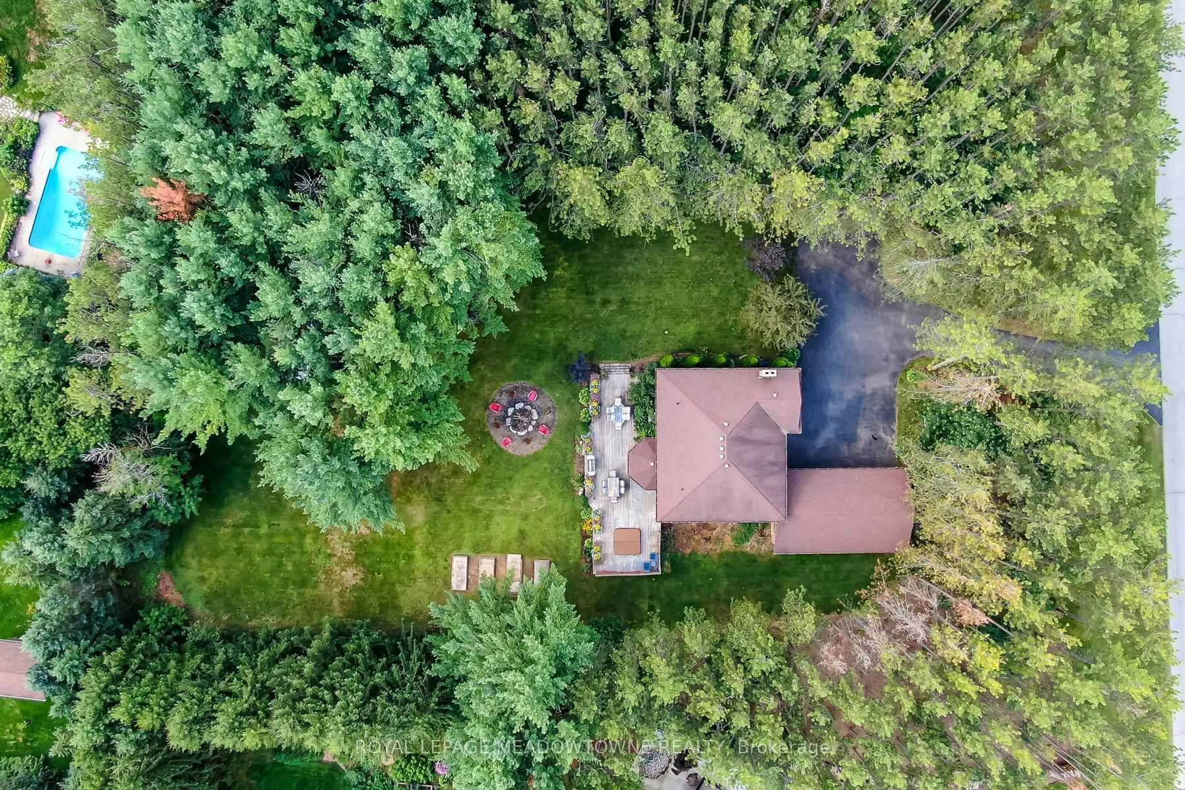A pic from outside/outdoor area/front of a property/back of a property/a pic from drone, forest/trees view for 4 Pine Ridge Rd, Erin Ontario N0B 1T0