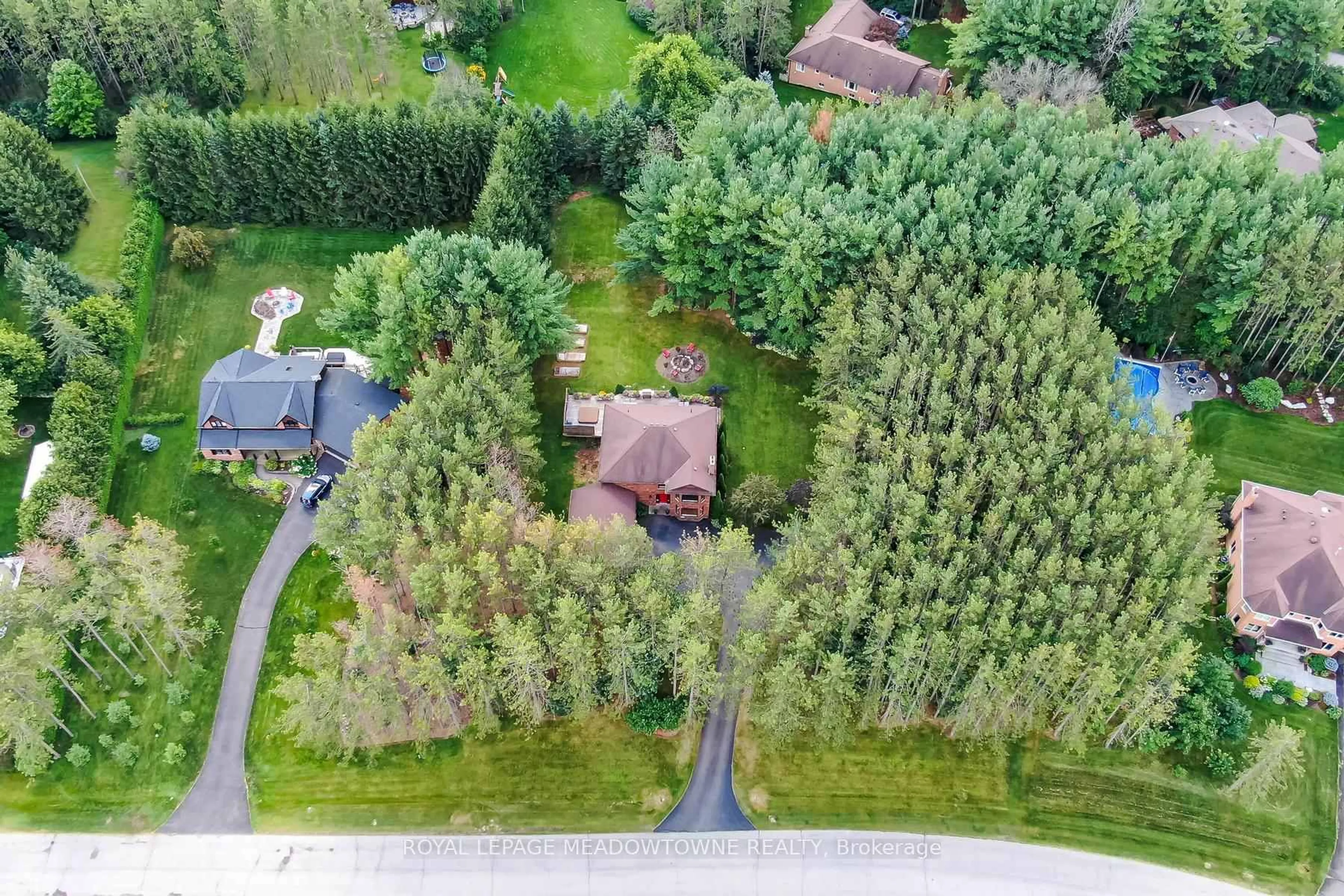 A pic from outside/outdoor area/front of a property/back of a property/a pic from drone, forest/trees view for 4 Pine Ridge Rd, Erin Ontario N0B 1T0