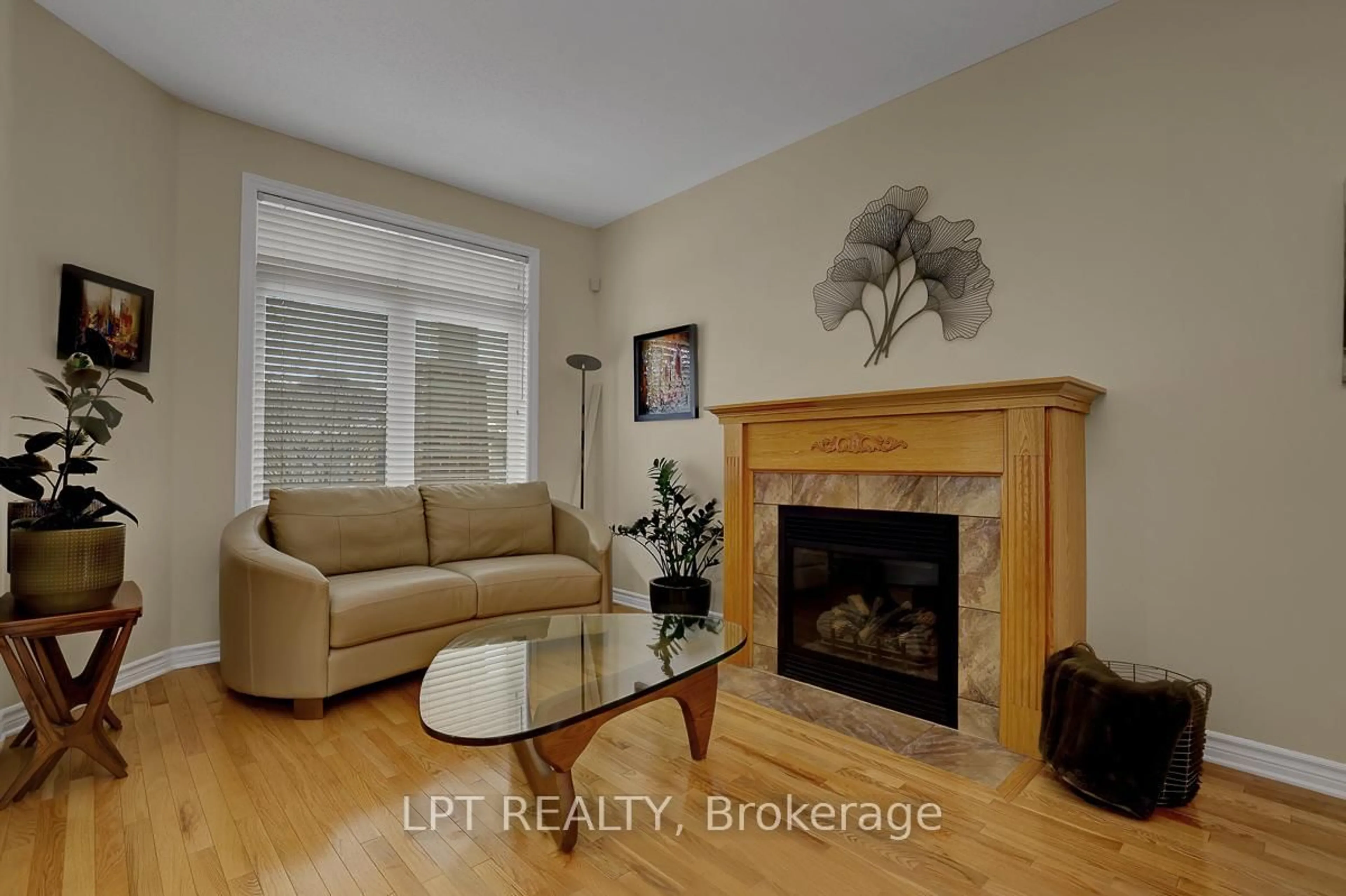 Living room with furniture, wood/laminate floor for 346 Jackson Stitt Circ, Ottawa Ontario K2S 0C4