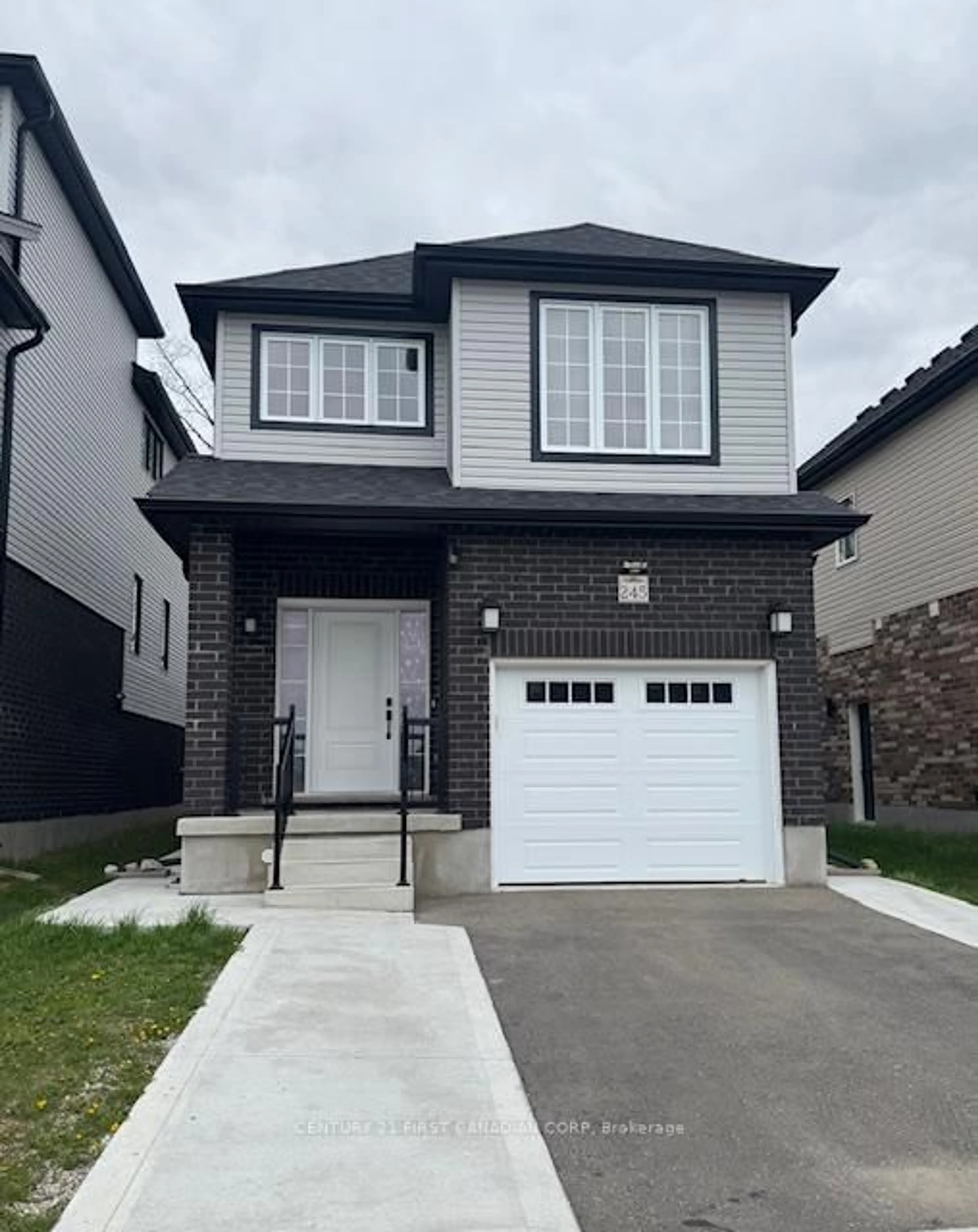 Home with brick exterior material, street for 245 Wesley Blvd, Cambridge Ontario N1T 0C6