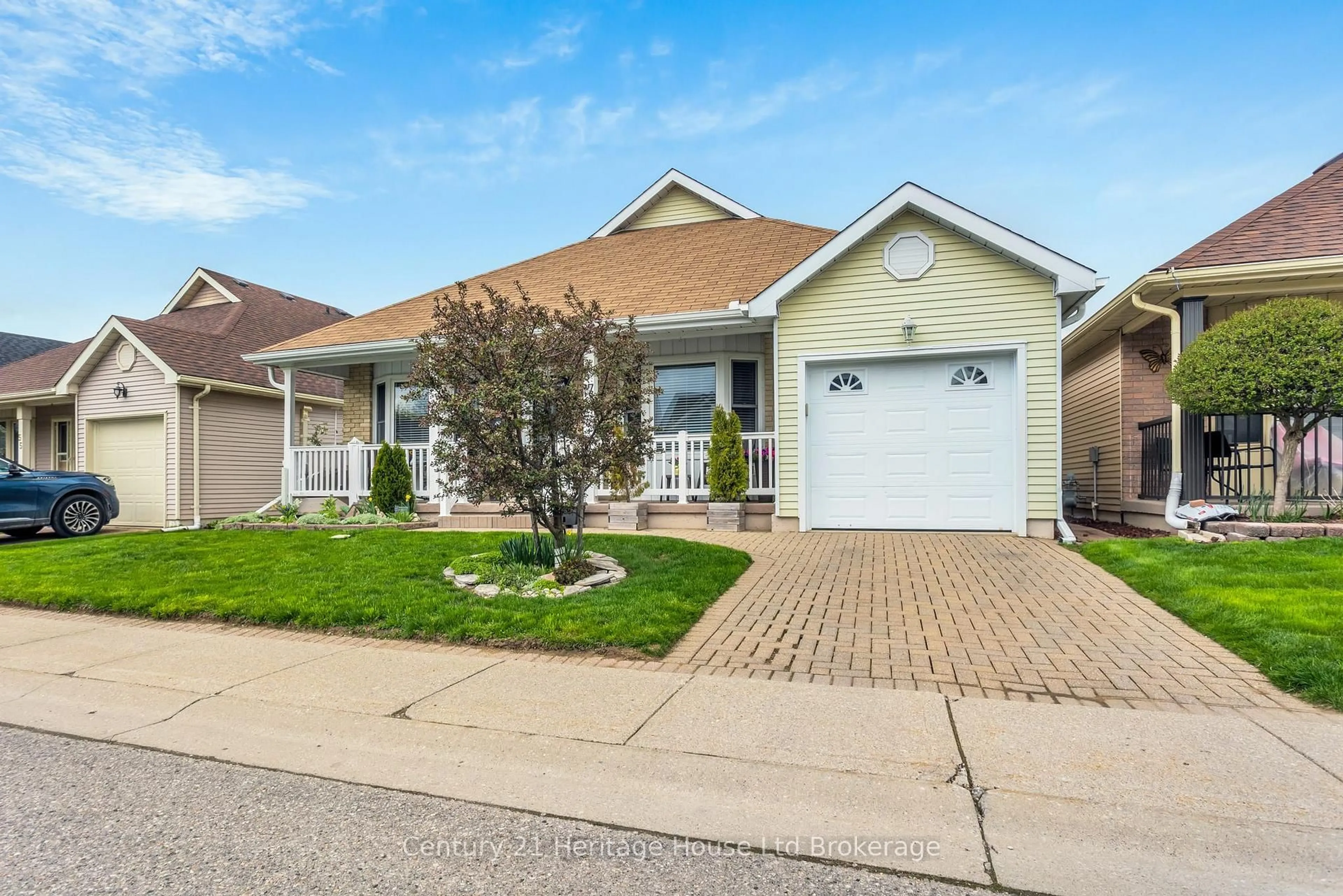 Home with vinyl exterior material, street for 57 Edwin Cres, Tillsonburg Ontario N4G 5H6