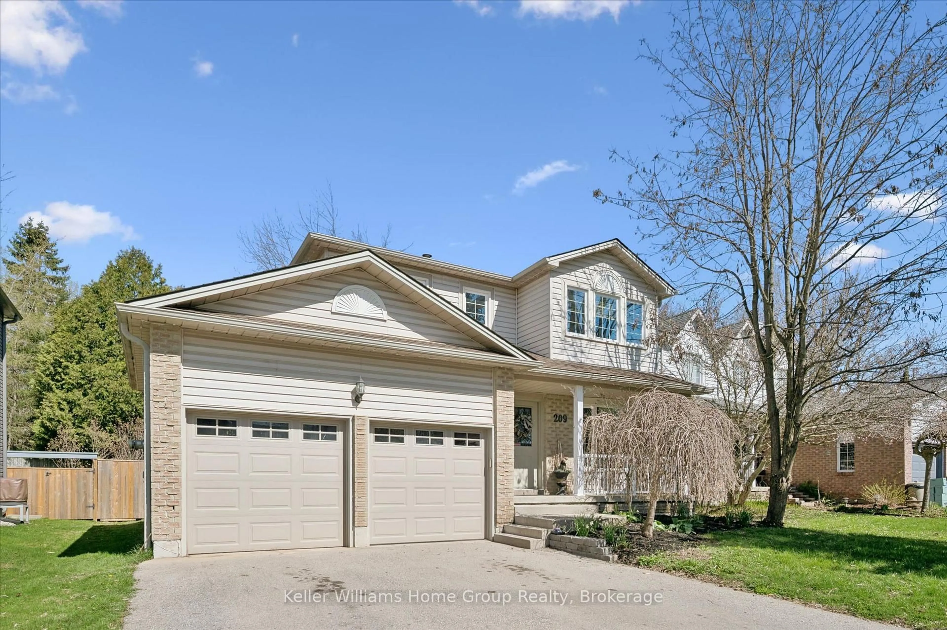 Home with brick exterior material, street for 209 Elizabeth Cres, Centre Wellington Ontario N1M 3N1