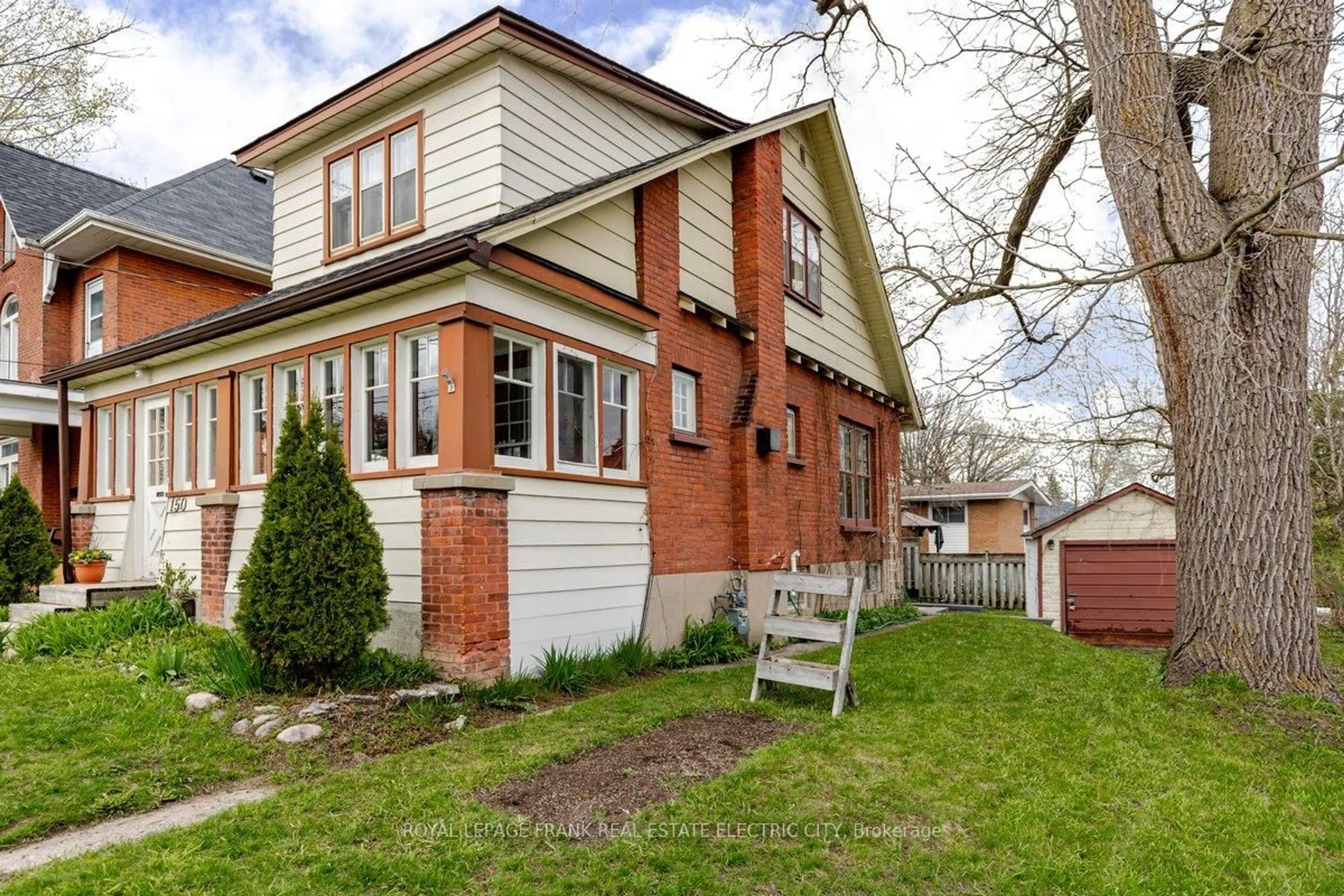 Home with brick exterior material, street for 150 Benson Ave, Peterborough Ontario K9H 5Y3