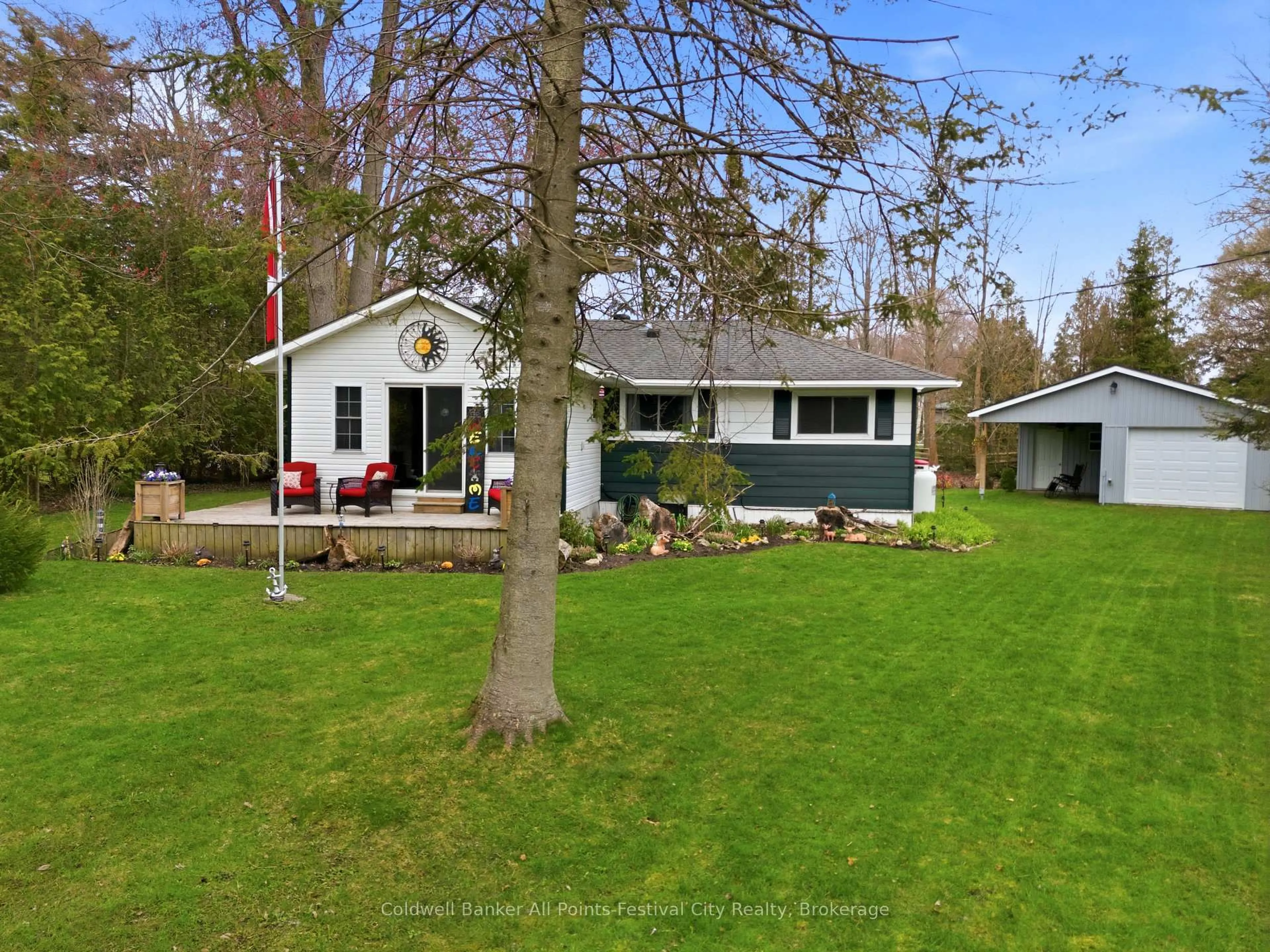 A pic from outside/outdoor area/front of a property/back of a property/a pic from drone, water/lake/river/ocean view for 702 Yosacha Pl, Huron-Kinloss Ontario N2Z 2X3