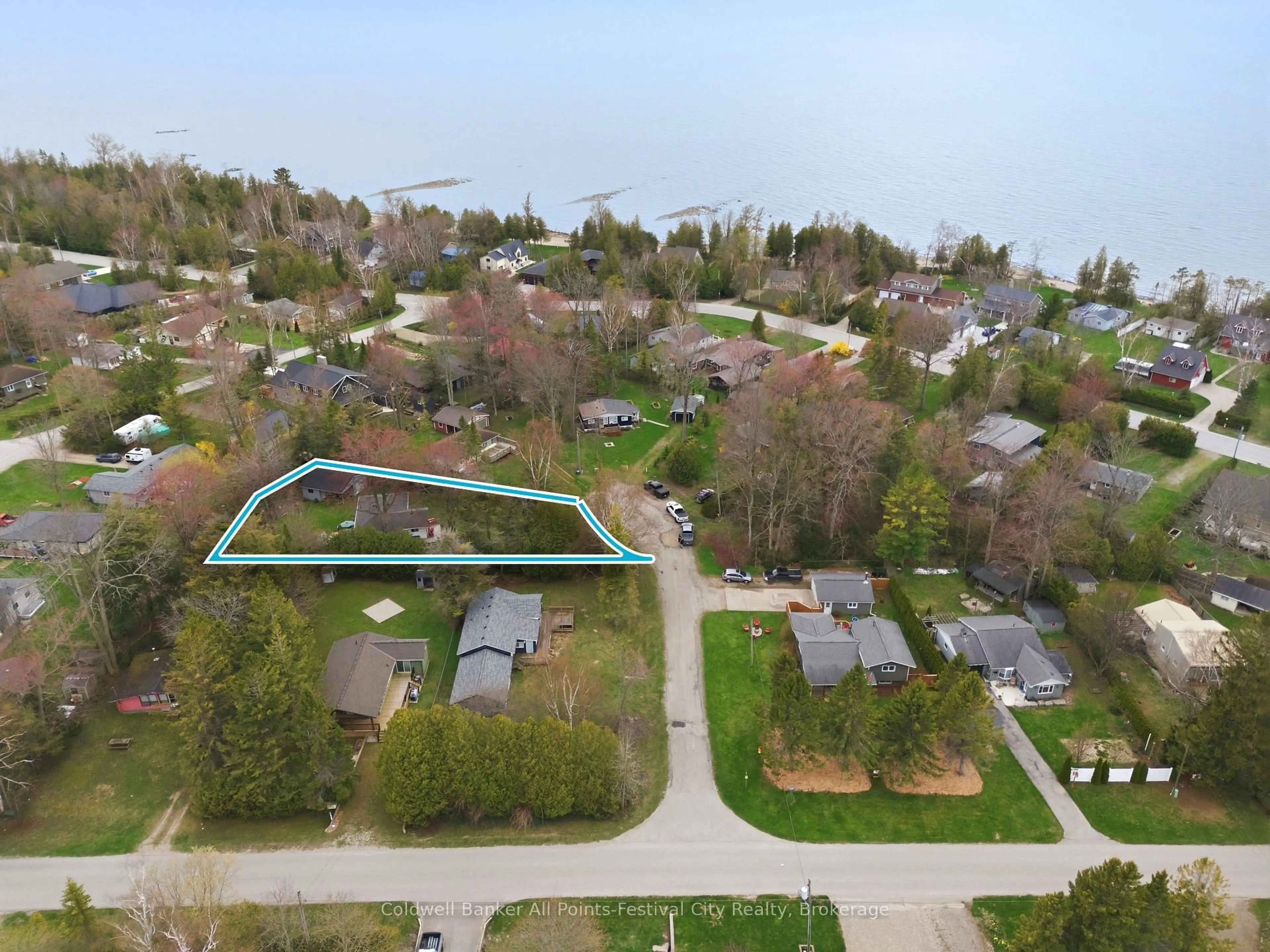 A pic from outside/outdoor area/front of a property/back of a property/a pic from drone, water/lake/river/ocean view for 702 Yosacha Pl, Huron-Kinloss Ontario N2Z 2X3