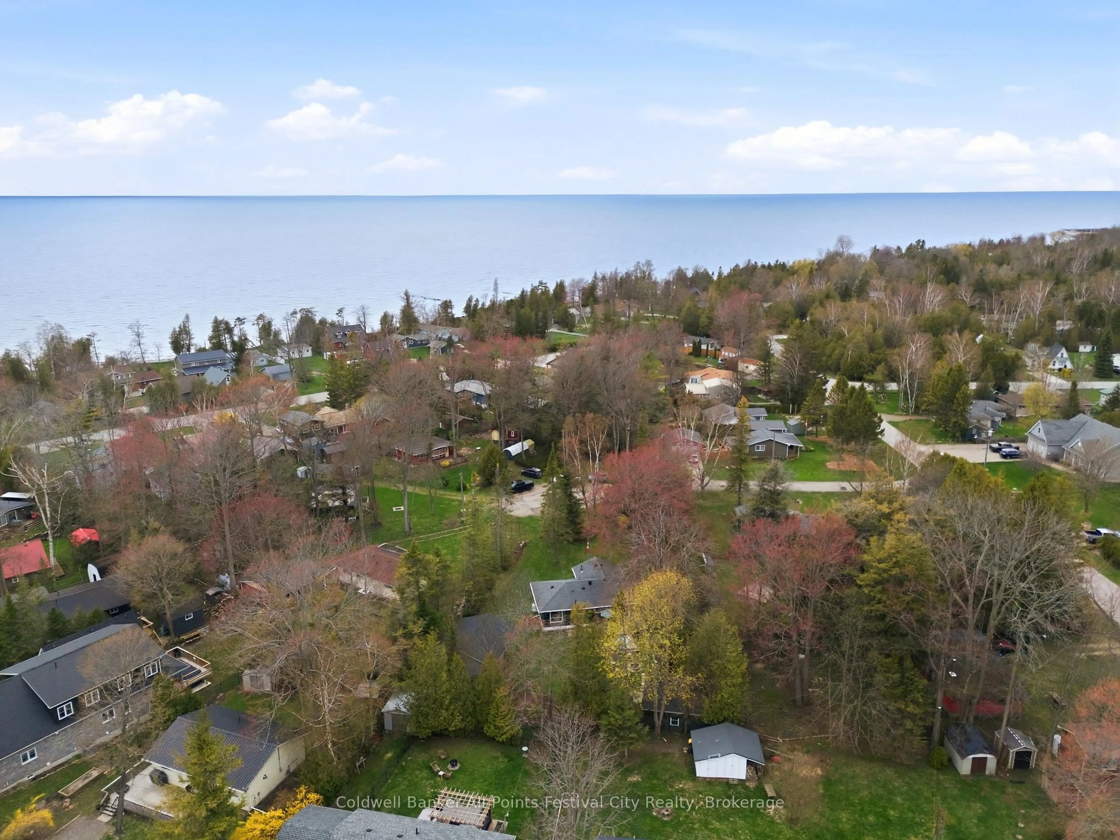 A pic from outside/outdoor area/front of a property/back of a property/a pic from drone, water/lake/river/ocean view for 702 Yosacha Pl, Huron-Kinloss Ontario N2Z 2X3