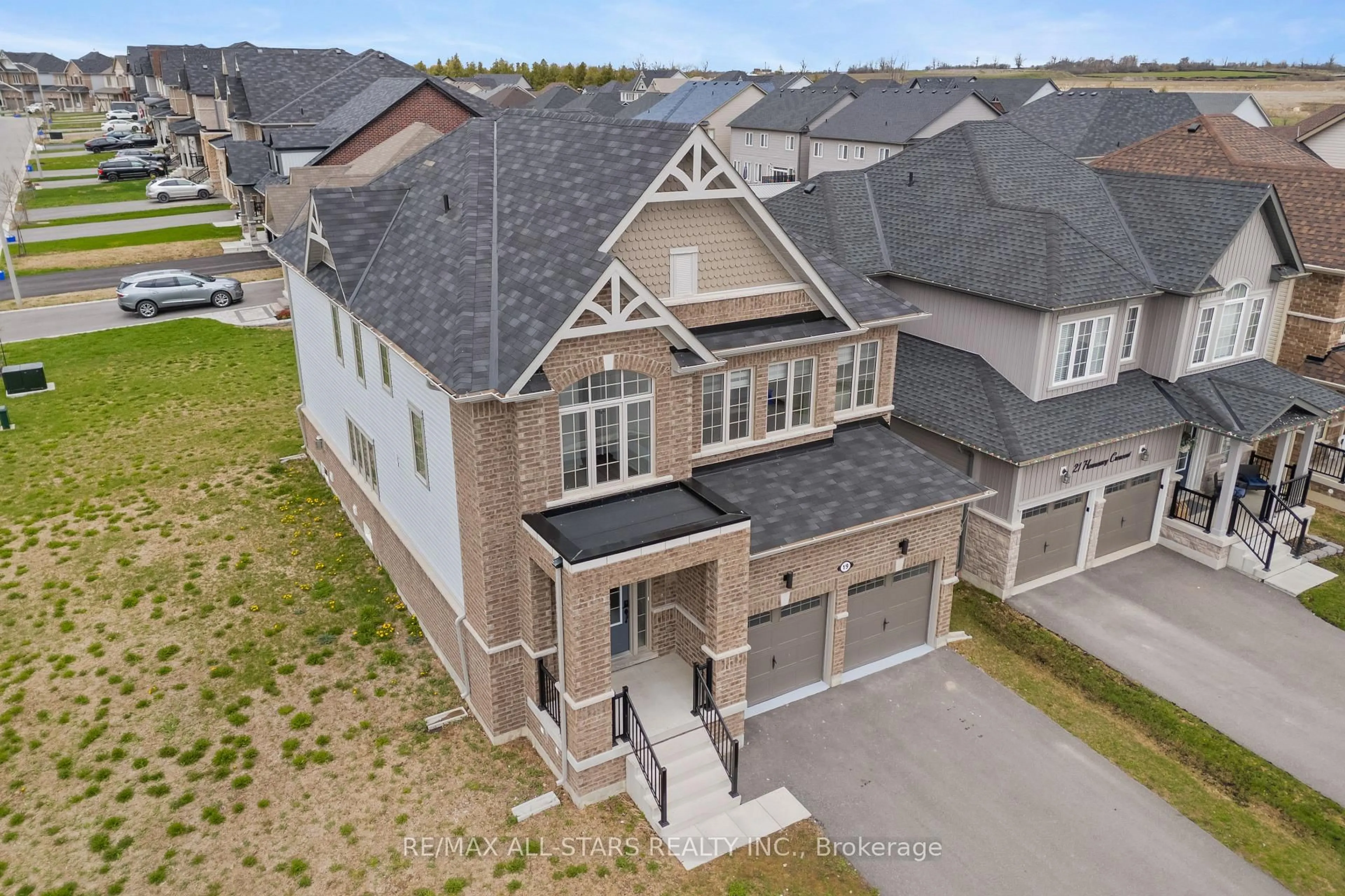 A pic from outside/outdoor area/front of a property/back of a property/a pic from drone, street for 19 Hennessey Cres, Kawartha Lakes Ontario K9V 0P2