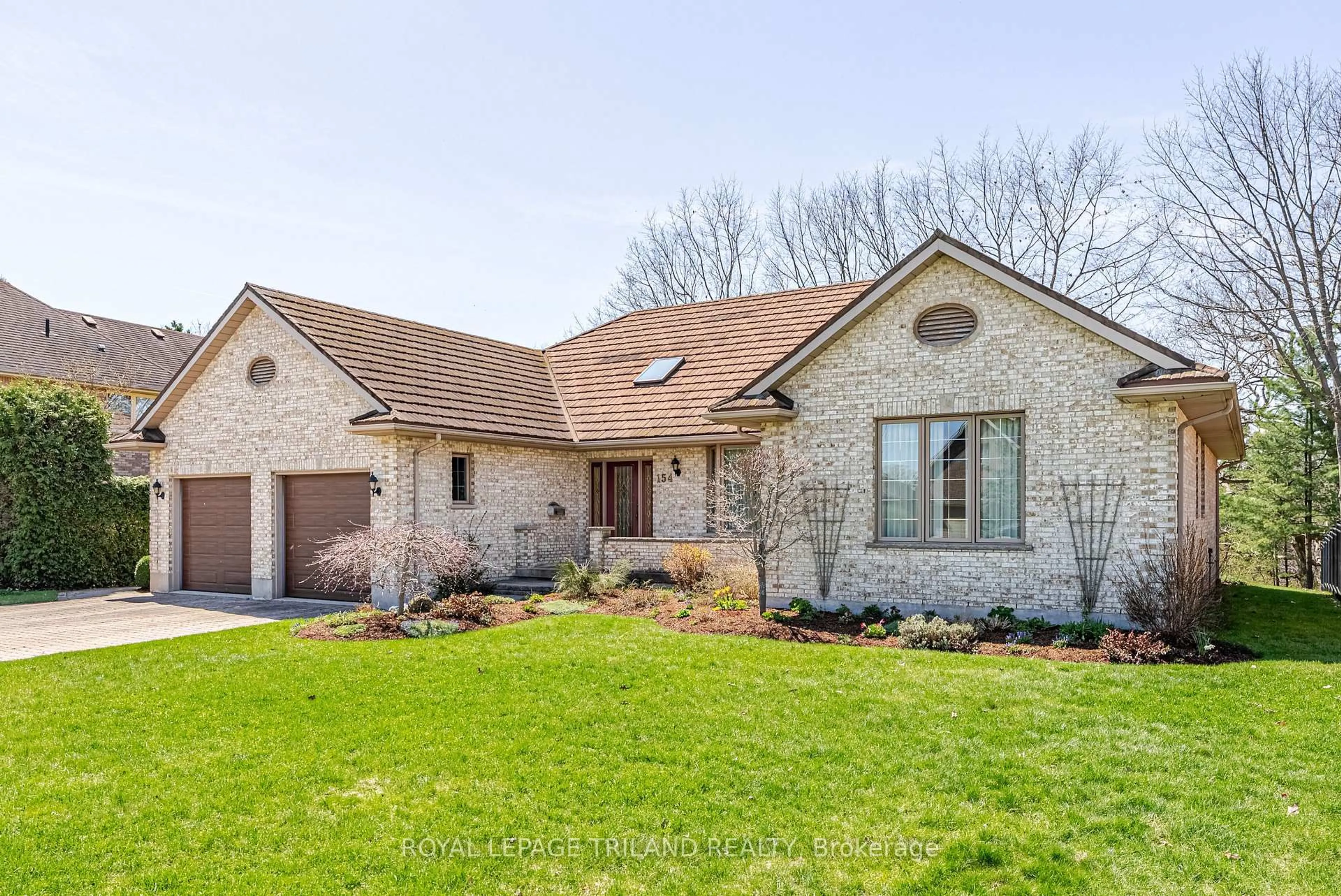Home with brick exterior material, street for 154 Parkview Dr, Thames Centre Ontario N0L 1G2