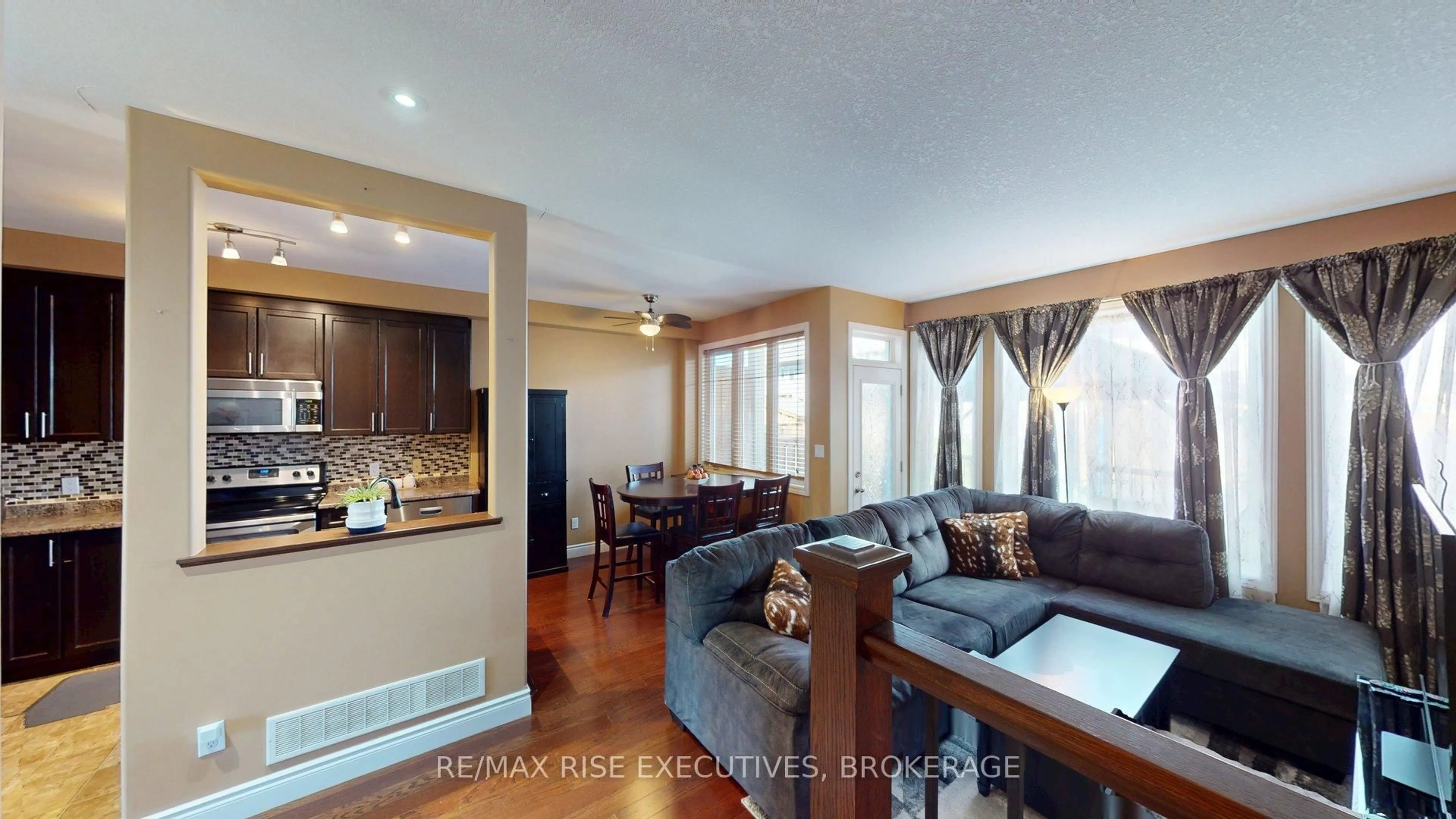 Living room with furniture, wood/laminate floor for 314 Janette St, Kingston Ontario K7L 4V2