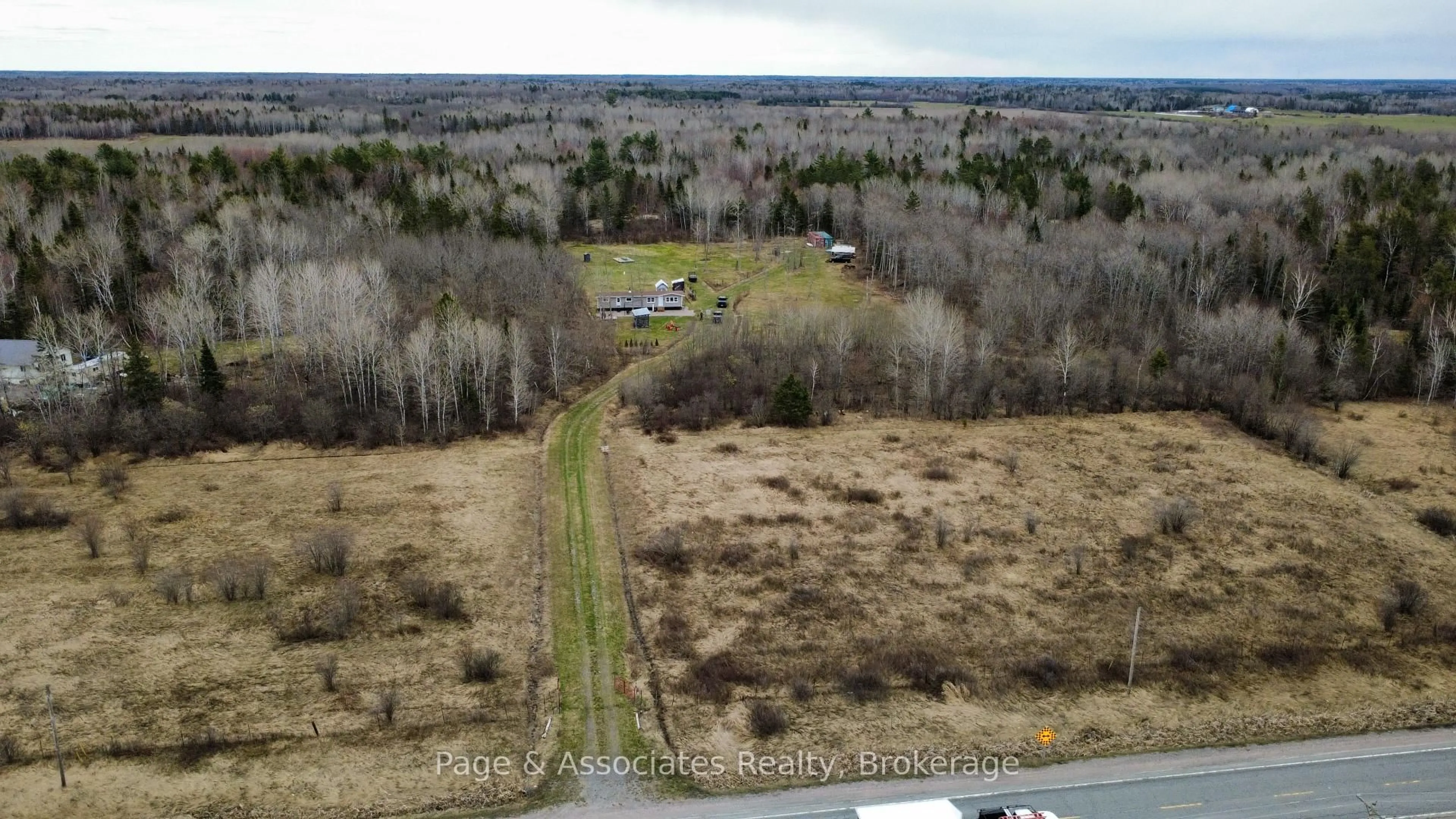 A pic from outside/outdoor area/front of a property/back of a property/a pic from drone, forest/trees view for 4456 Highway 535, St. Charles Ontario P0M 2W0