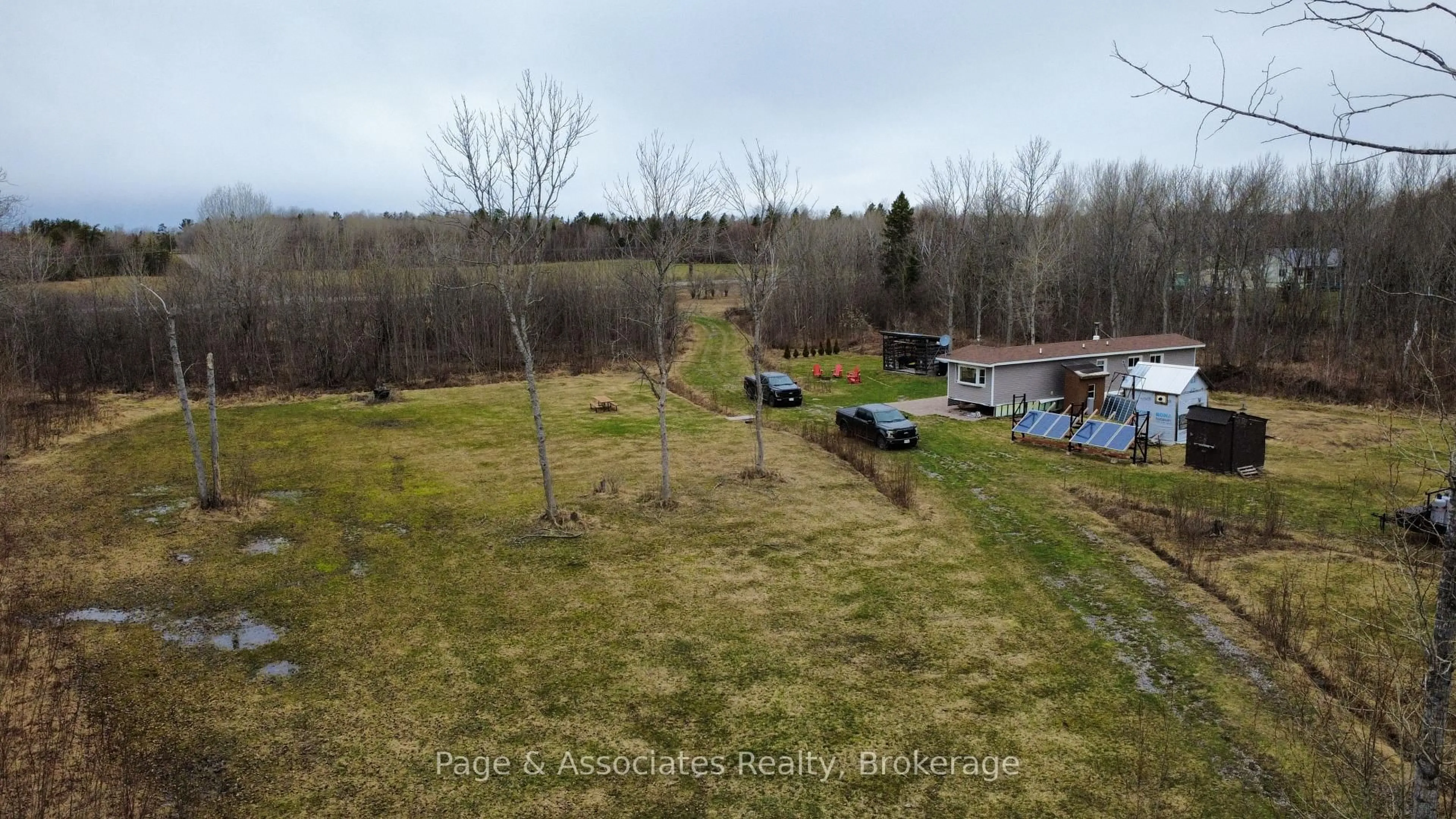 A pic from outside/outdoor area/front of a property/back of a property/a pic from drone, water/lake/river/ocean view for 4456 Highway 535, St. Charles Ontario P0M 2W0