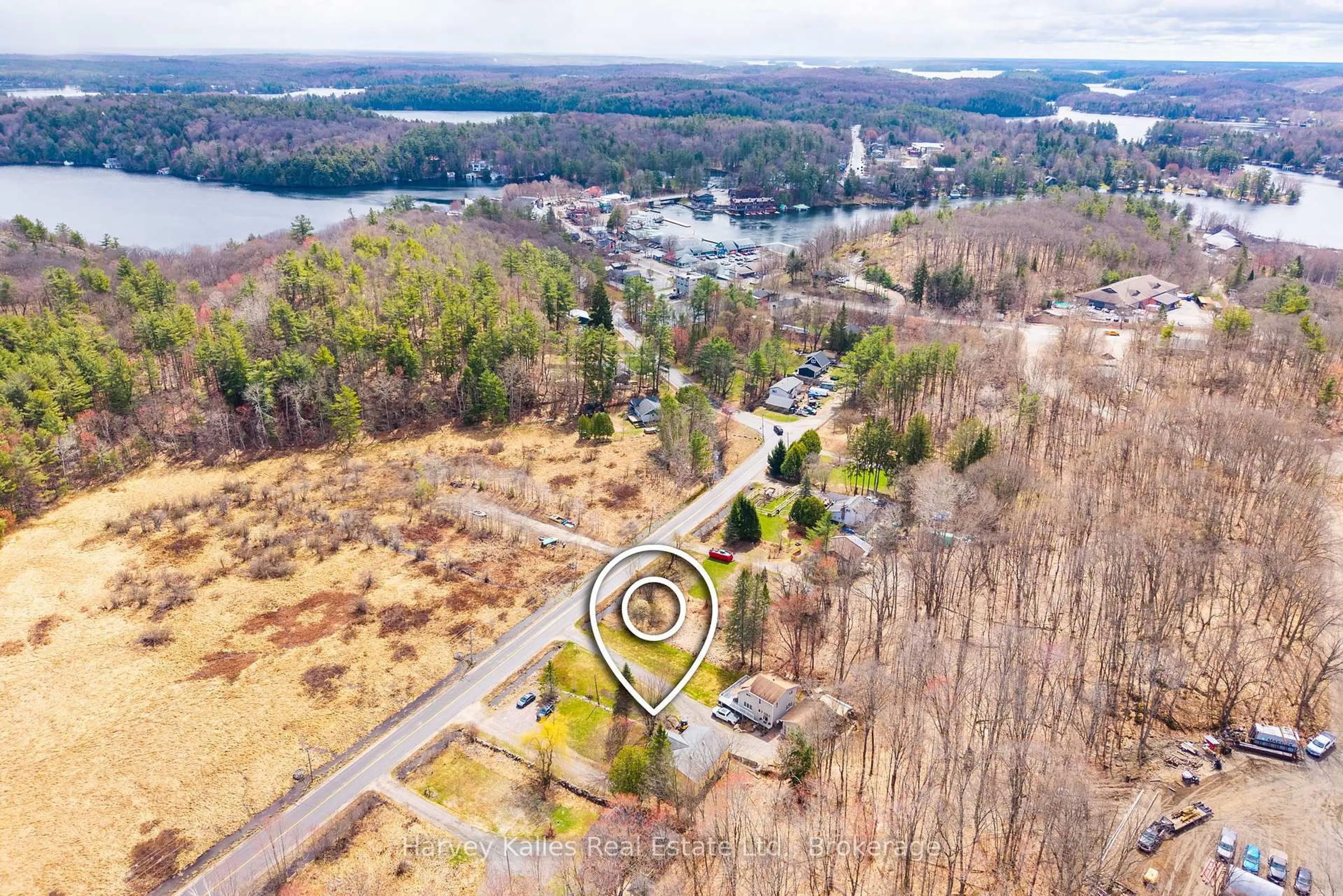 A pic from outside/outdoor area/front of a property/back of a property/a pic from drone, water/lake/river/ocean view for 25 Ferndale Rd, Muskoka Lakes Ontario P0B 1J0