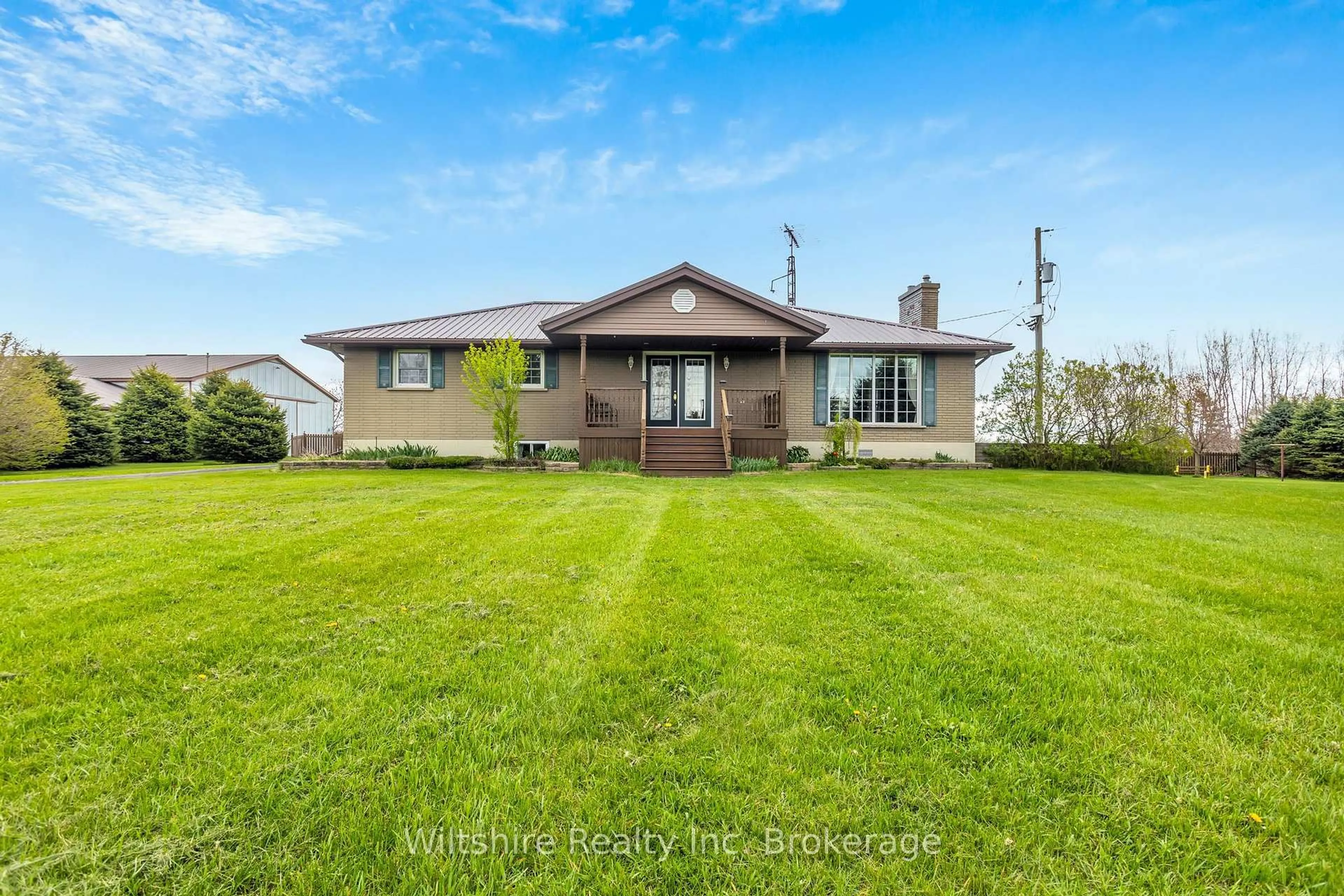 A pic from outside/outdoor area/front of a property/back of a property/a pic from drone, water/lake/river/ocean view for 490 Norfolk County 28 Rd, Norfolk Ontario N0E 1G0