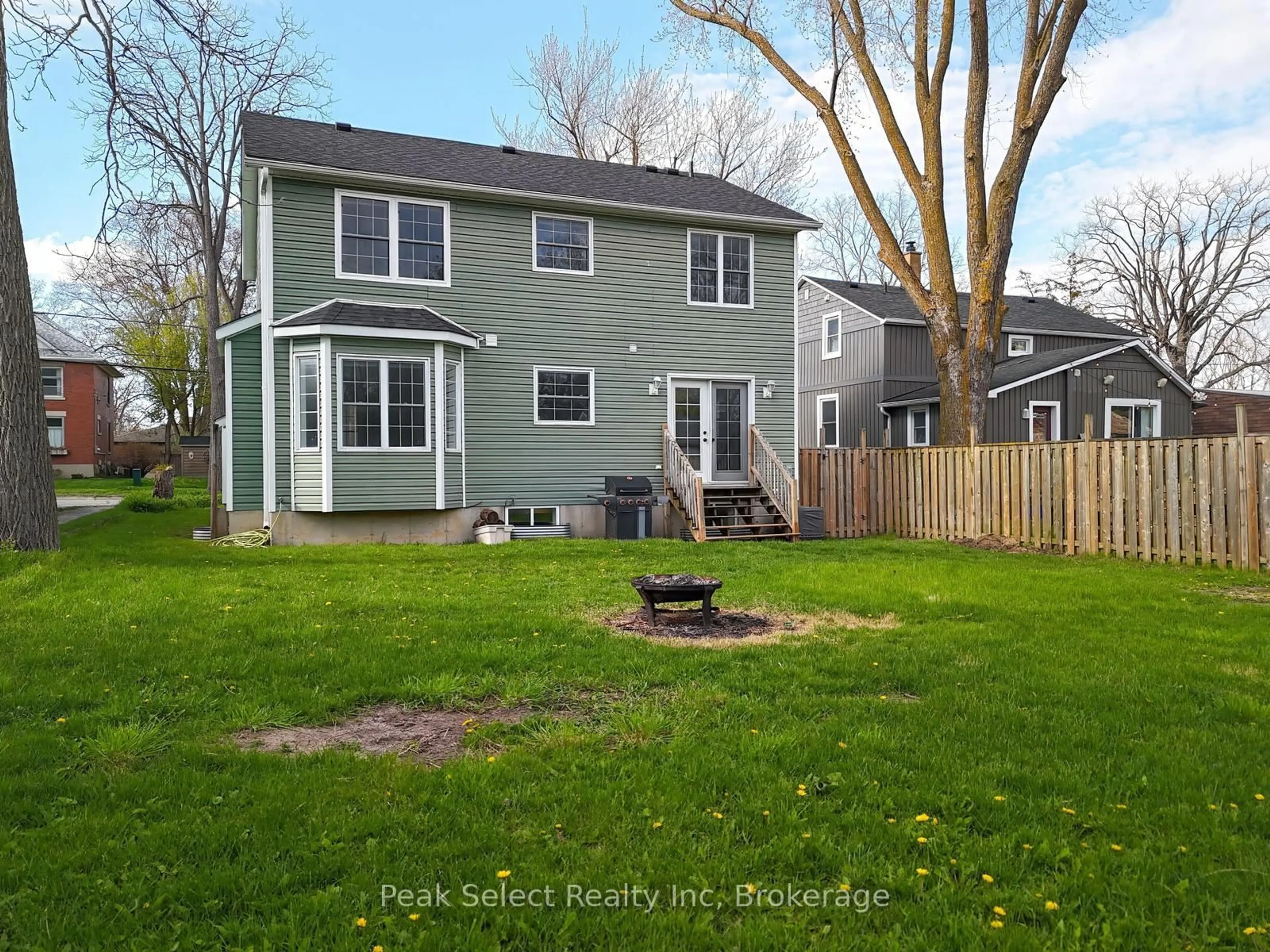 Home with vinyl exterior material, street for 202 Queen St, St. Marys Ontario N4X 1B7