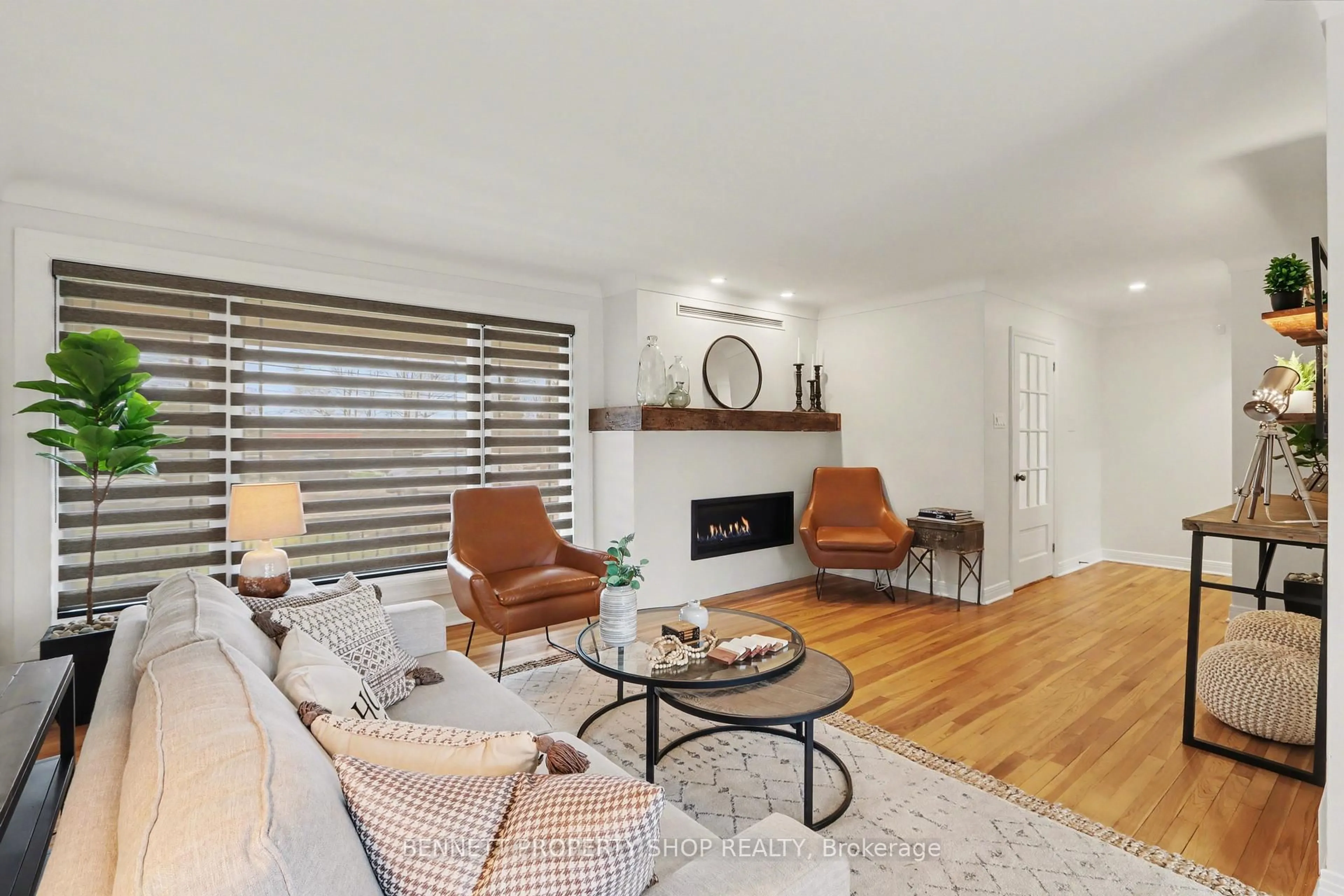 Living room with furniture, wood/laminate floor for 1202 Carp Rd, Ottawa Ontario K2S 1B9