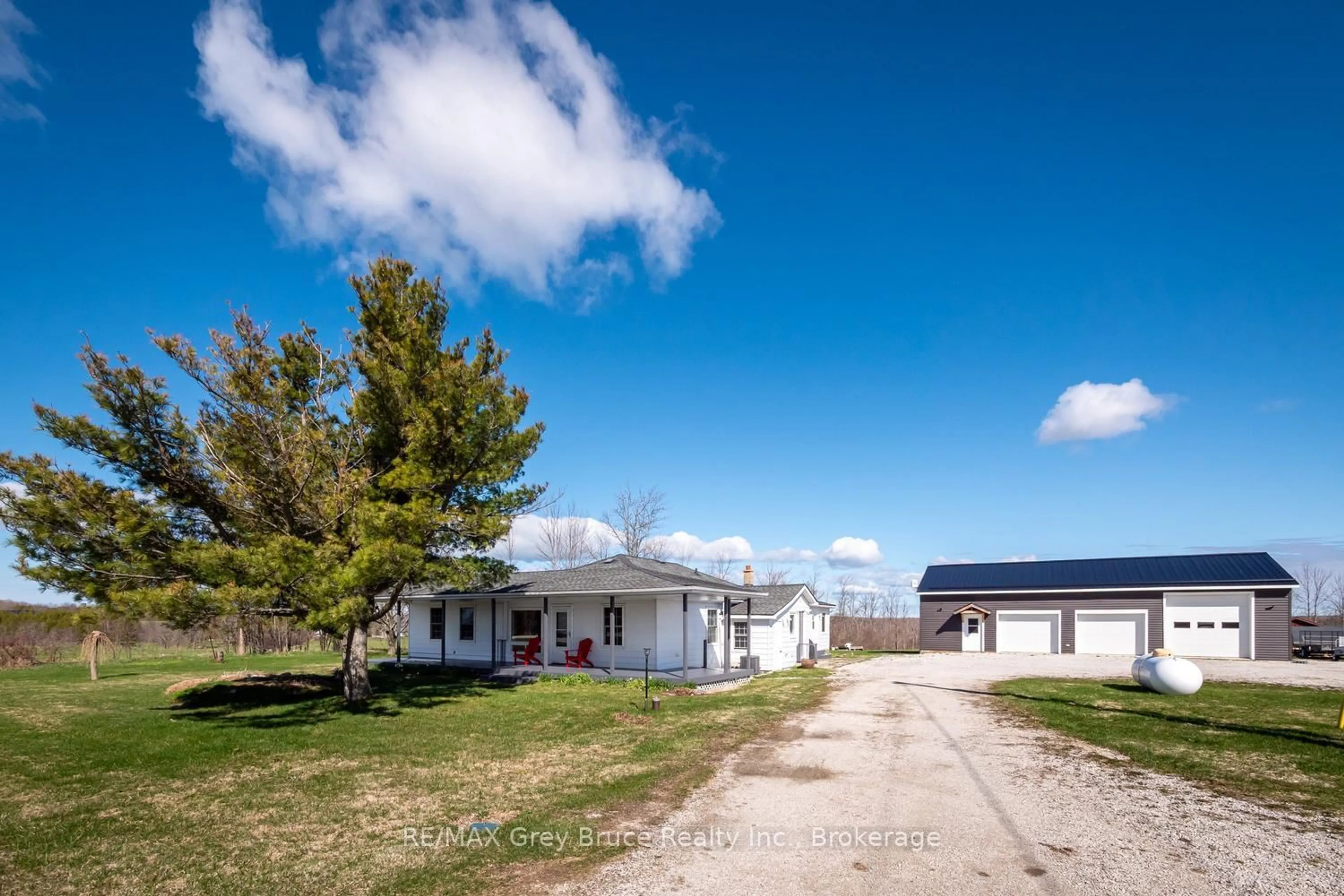 A pic from outside/outdoor area/front of a property/back of a property/a pic from drone, street for 158 Red Bay Rd, South Bruce Peninsula Ontario N0H 2T0