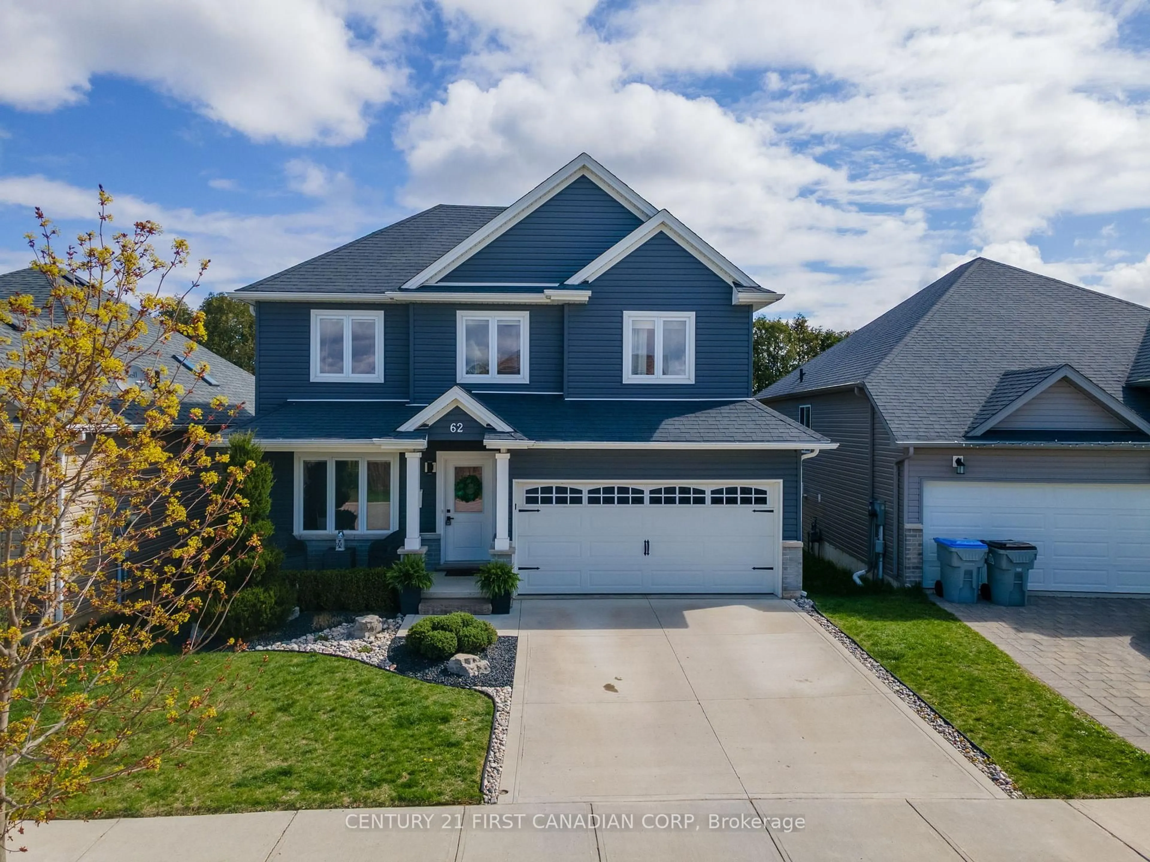 Home with vinyl exterior material, street for 62 Abbott St, Strathroy-Caradoc Ontario N7G 0B7