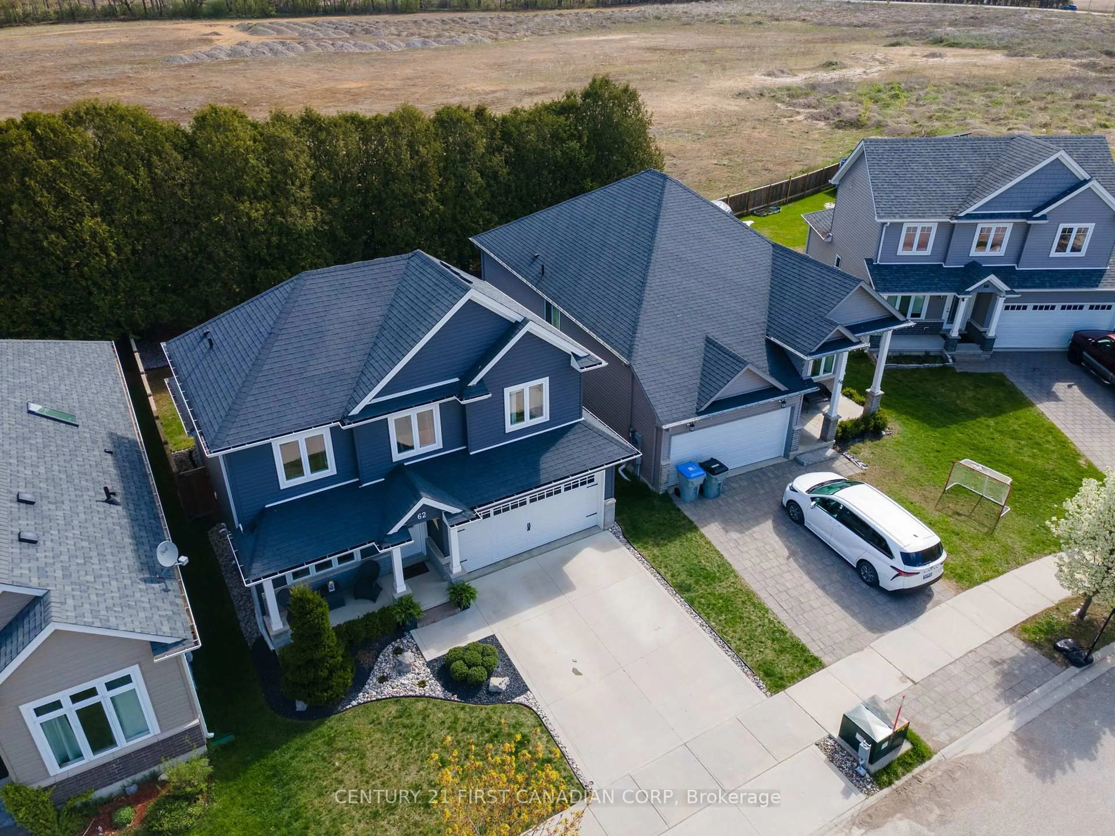 A pic from outside/outdoor area/front of a property/back of a property/a pic from drone, street for 62 Abbott St, Strathroy-Caradoc Ontario N7G 0B7