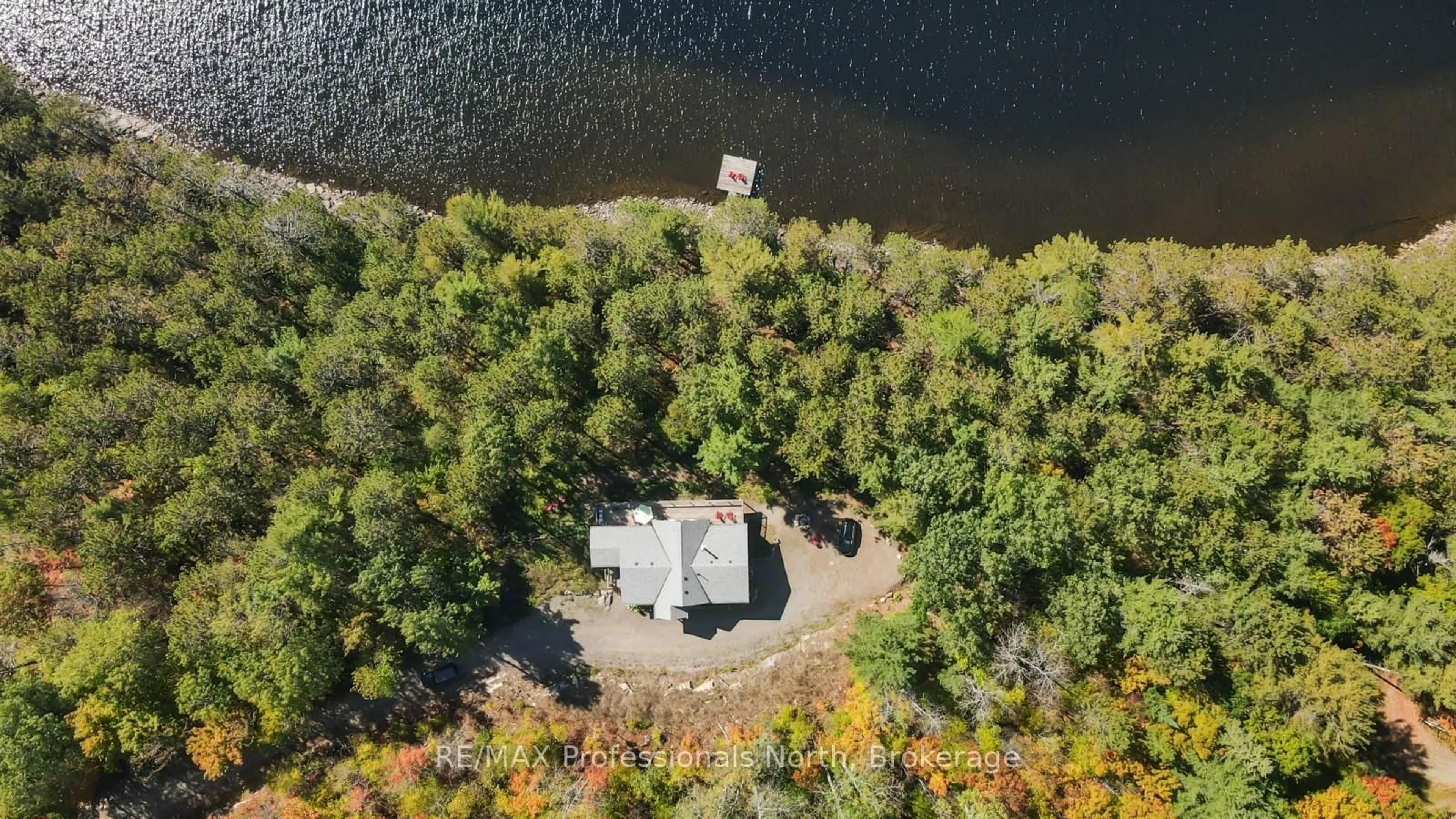 A pic from outside/outdoor area/front of a property/back of a property/a pic from drone, water/lake/river/ocean view for 1083 Kendra Crt, Dysart et al Ontario K0M 1S0