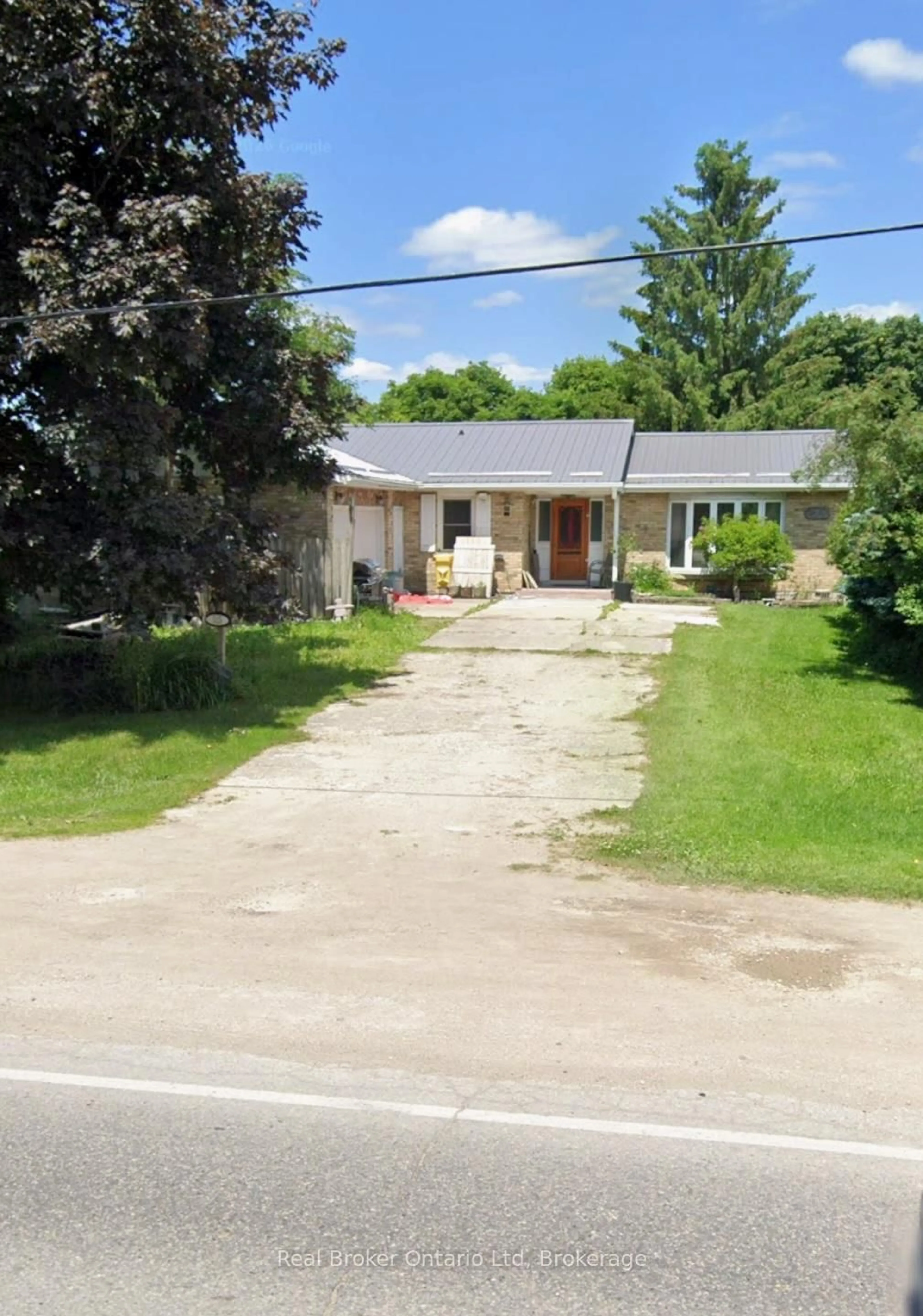 A pic from outside/outdoor area/front of a property/back of a property/a pic from drone, street for 525 Main St, Minto Ontario N0G 2P0