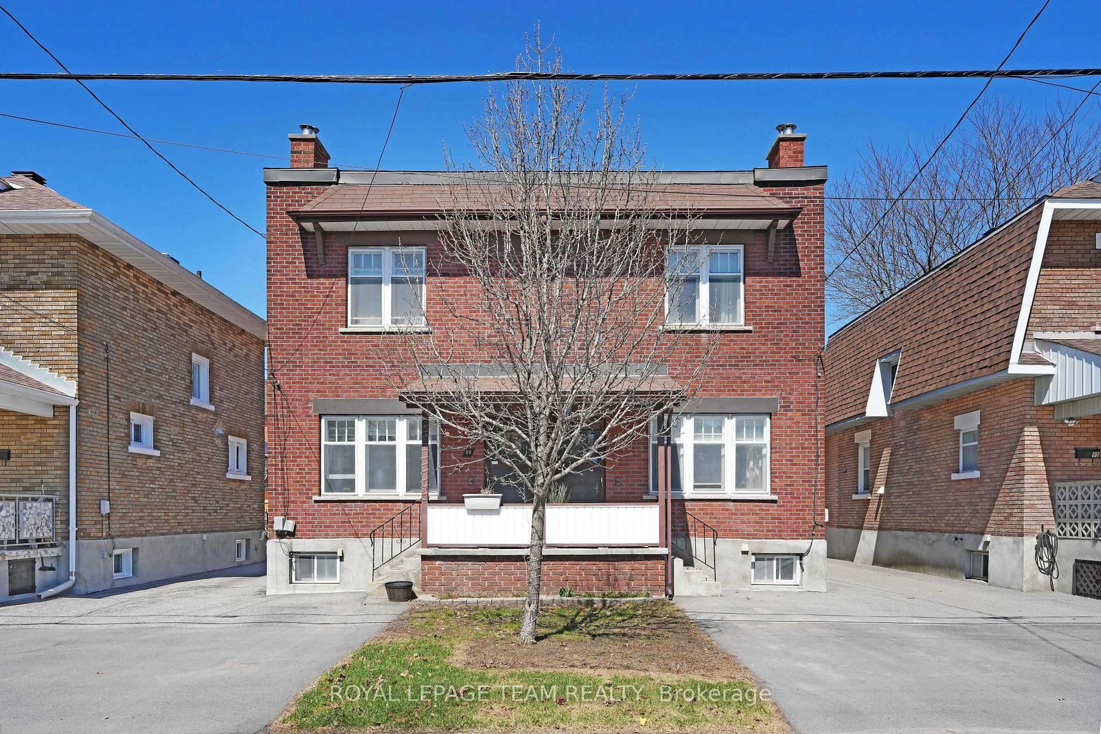 Home with brick exterior material, street for 87-89 Grove Ave, Ottawa Ontario K1S 3A7