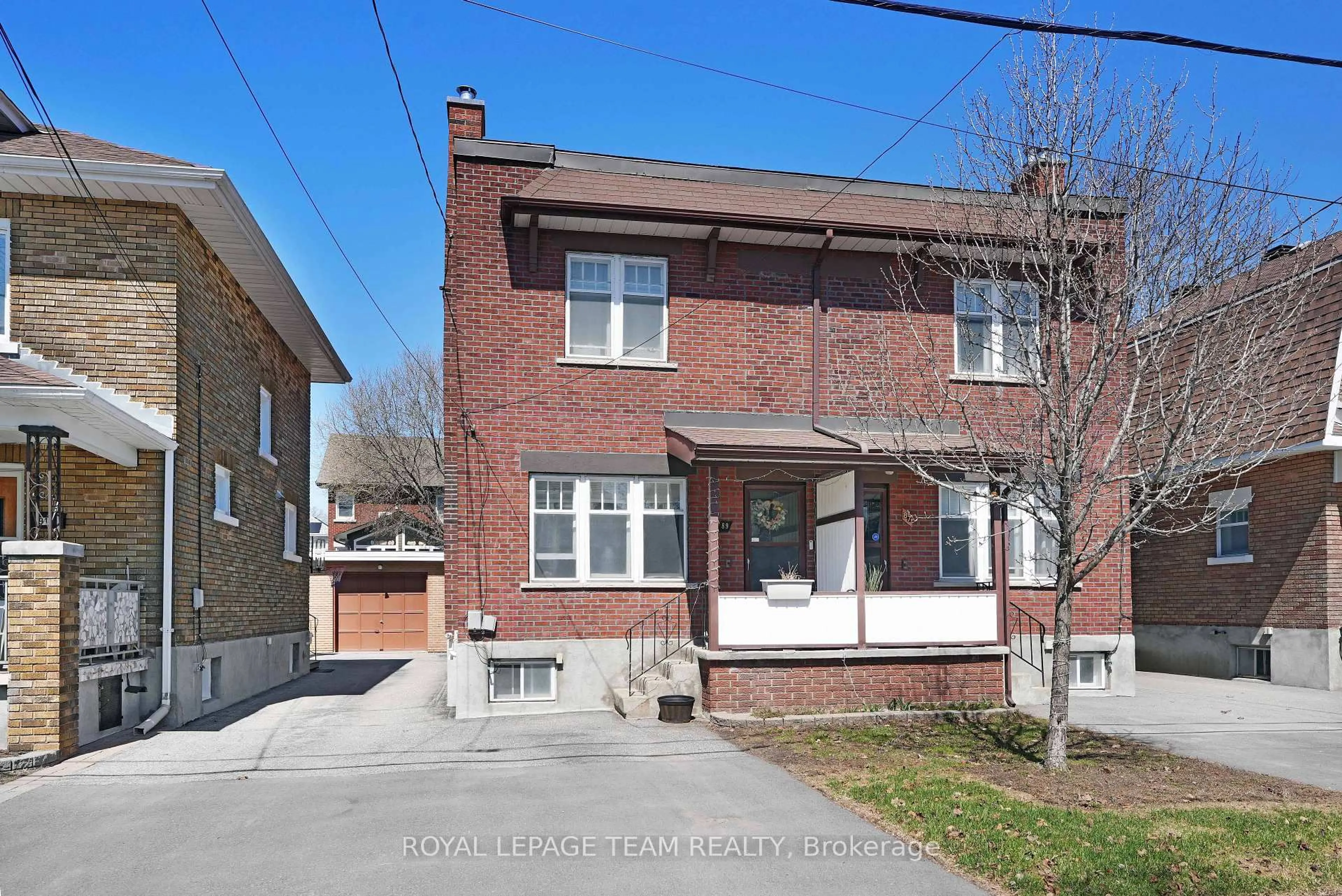 Home with brick exterior material, street for 87-89 Grove Ave, Ottawa Ontario K1S 3A7