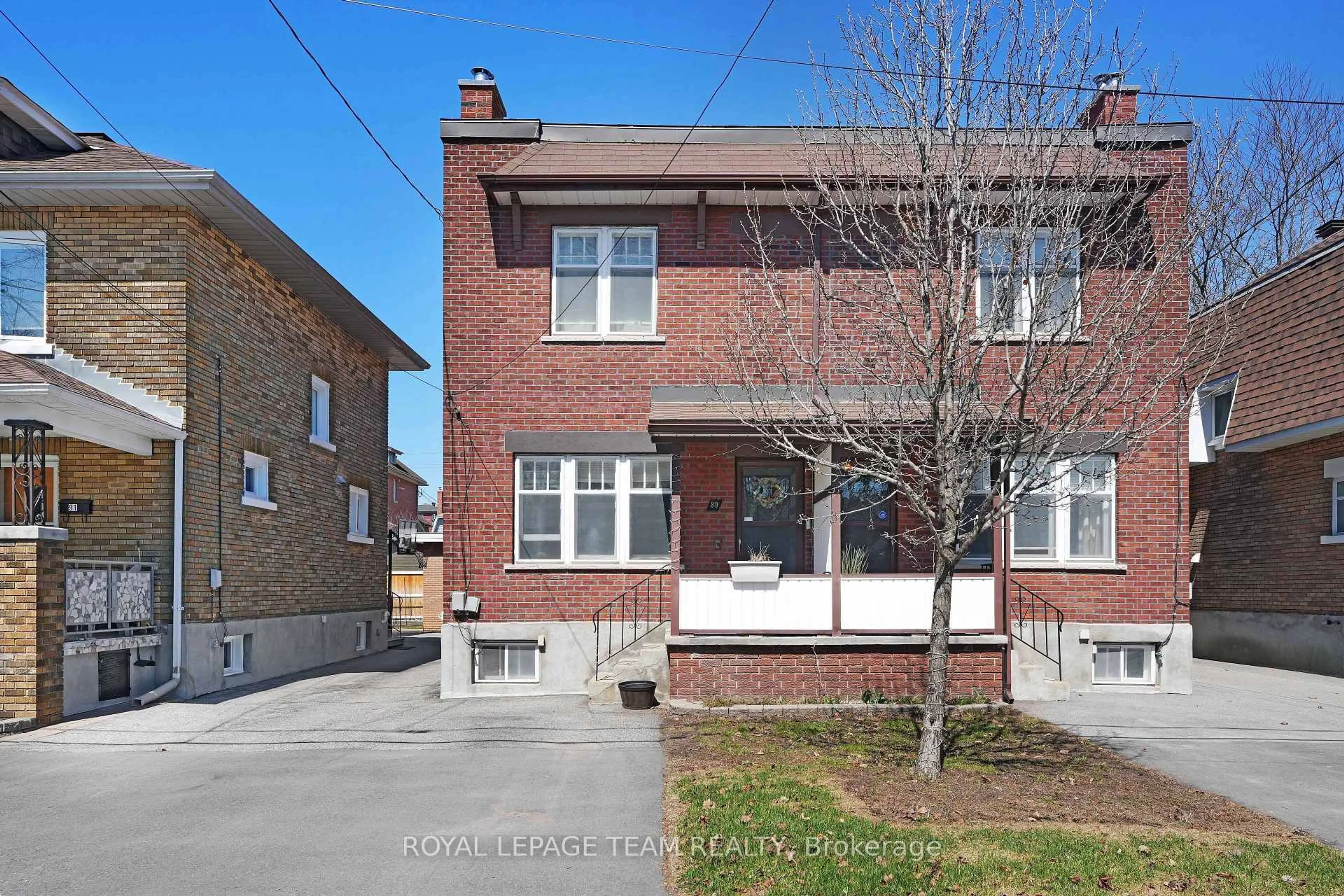 Home with brick exterior material, street for 87-89 Grove Ave, Ottawa Ontario K1S 3A7