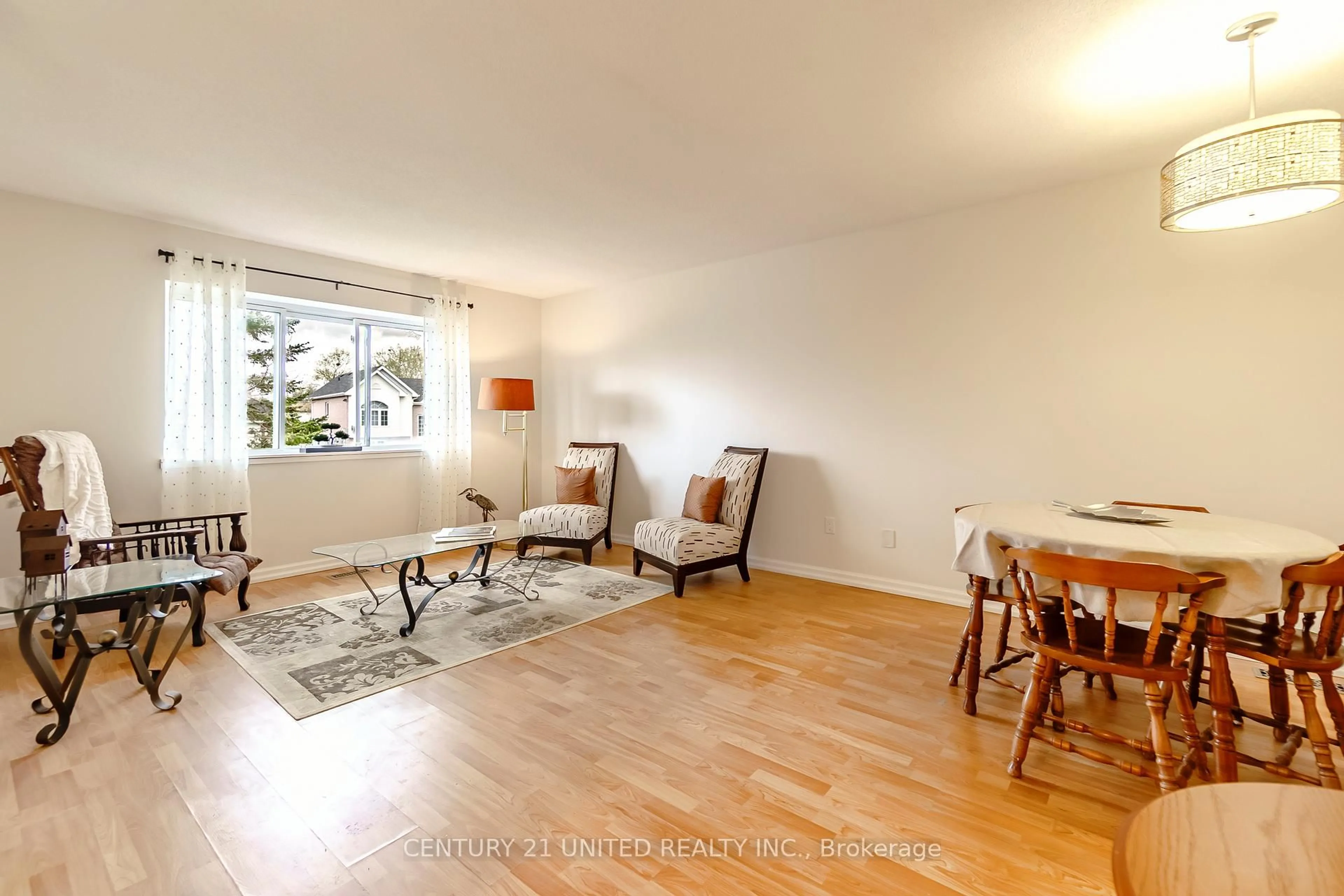 Living room with furniture, wood/laminate floor for 2272 Inglewood Rd, Peterborough Ontario K9K 2G3