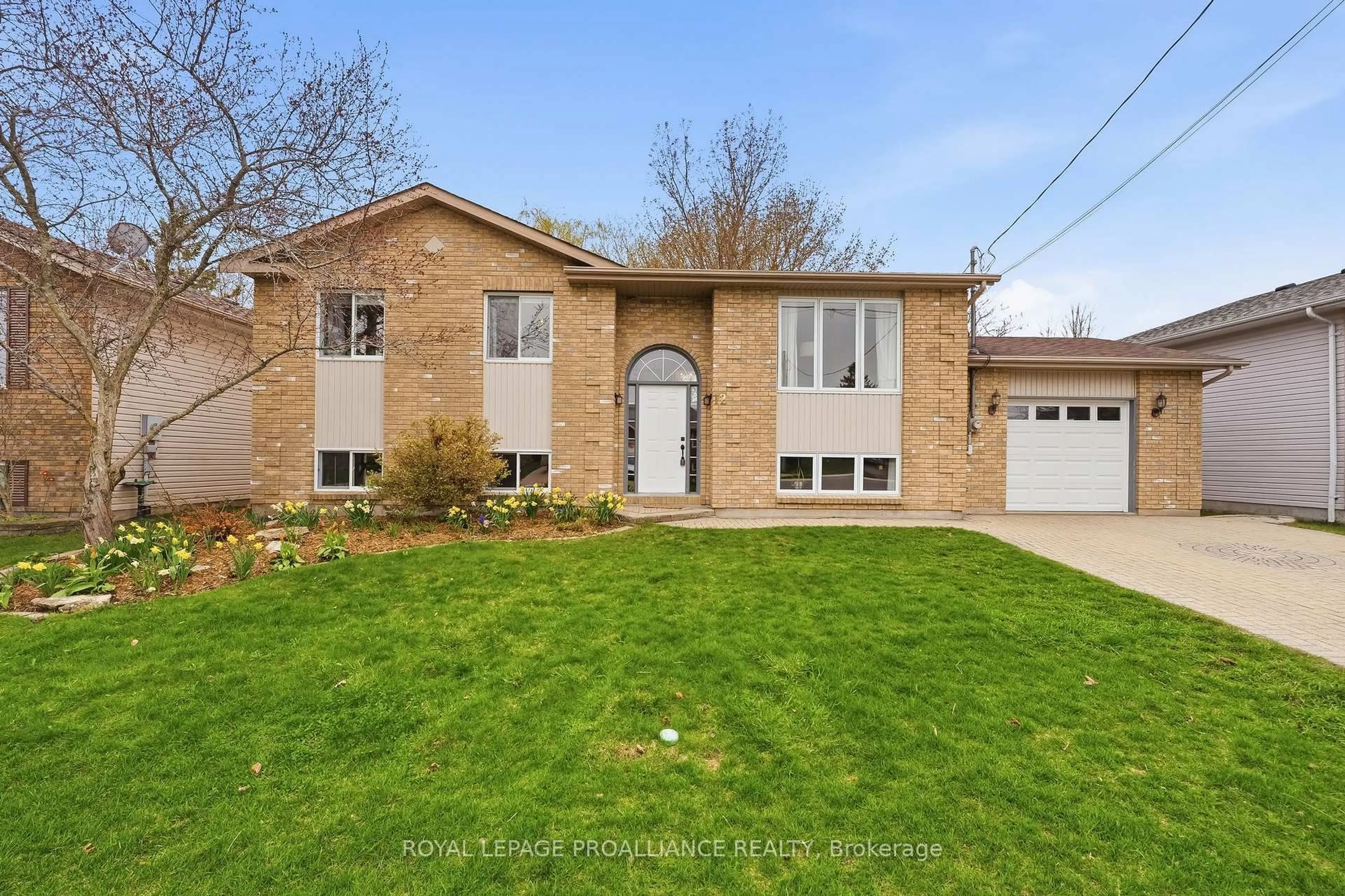 Home with brick exterior material, street for 12 Marina Dr, Brighton Ontario K0K 1H0