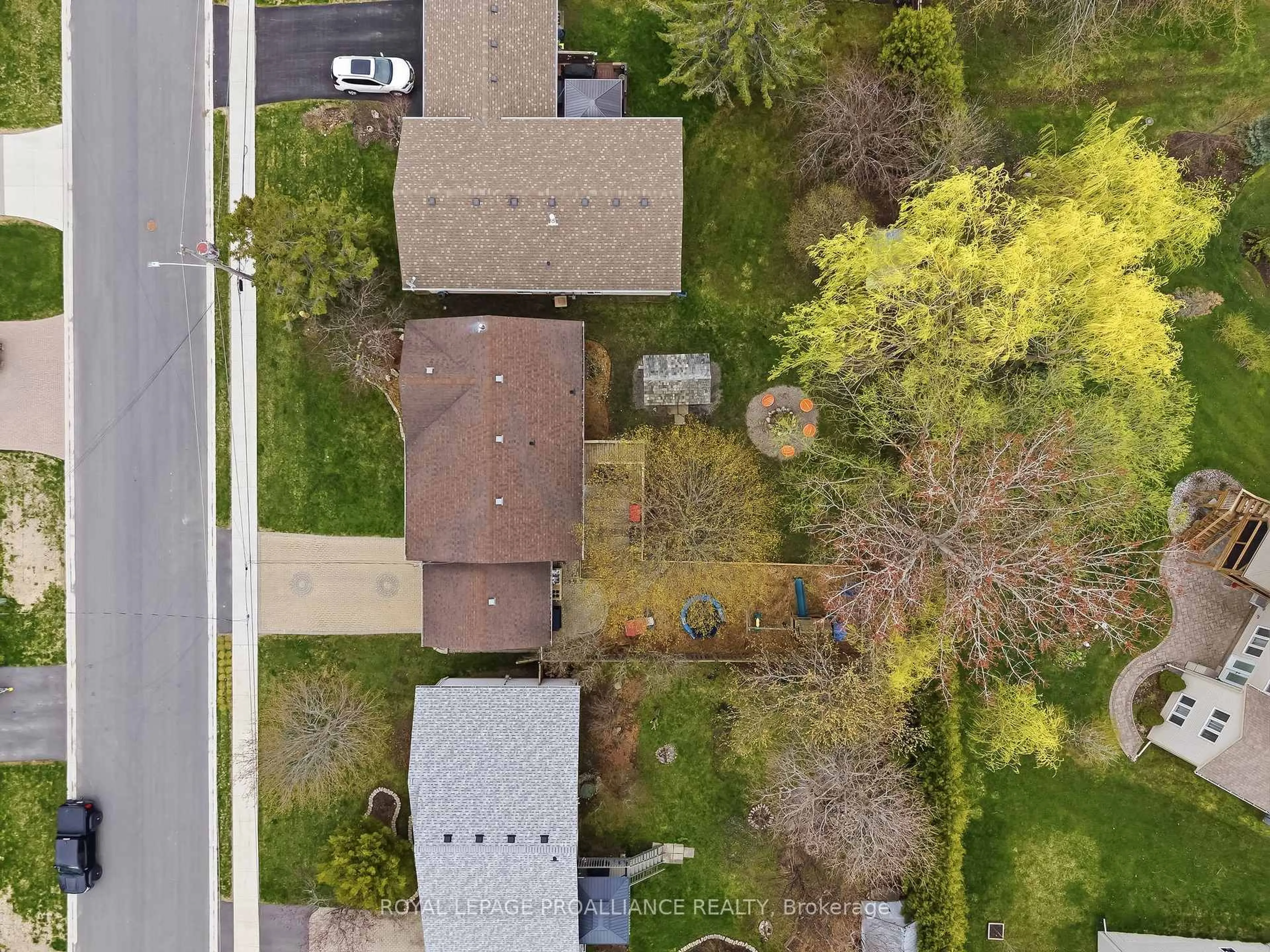 A pic from outside/outdoor area/front of a property/back of a property/a pic from drone, street for 12 Marina Dr, Brighton Ontario K0K 1H0